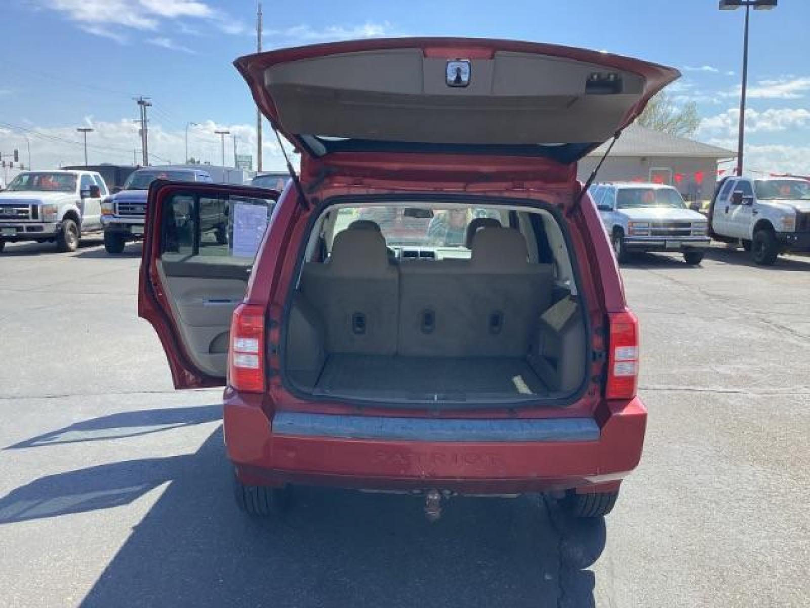 2008 Inferno Red Crystal Pearl /Dark Slate Gray Cloth Interior Jeep Patriot Sport 4WD (1J8FF28W28D) with an 2.4L L4 DOHC 16V engine, located at 1235 N Woodruff Ave., Idaho Falls, 83401, (208) 523-1053, 43.507172, -112.000488 - The 2008 Jeep Patriot Sport offers a combination of rugged styling, practicality, and capability. Here are some key features you can typically find in the 2008 Jeep Patriot Sport: Engine Options: The Patriot Sport typically comes with a choice of two engine options: 2.0-liter four-cylinder engine: - Photo #15