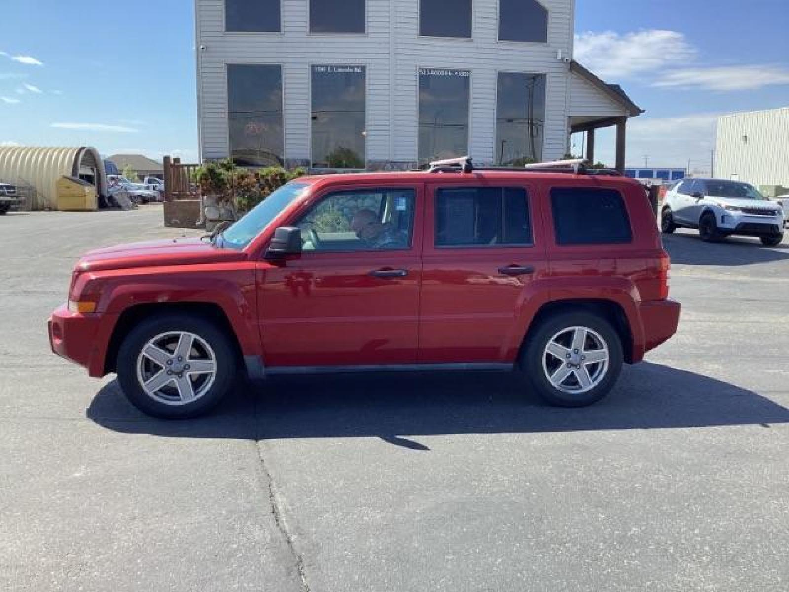 2008 Inferno Red Crystal Pearl /Dark Slate Gray Cloth Interior Jeep Patriot Sport 4WD (1J8FF28W28D) with an 2.4L L4 DOHC 16V engine, located at 1235 N Woodruff Ave., Idaho Falls, 83401, (208) 523-1053, 43.507172, -112.000488 - The 2008 Jeep Patriot Sport offers a combination of rugged styling, practicality, and capability. Here are some key features you can typically find in the 2008 Jeep Patriot Sport: Engine Options: The Patriot Sport typically comes with a choice of two engine options: 2.0-liter four-cylinder engine: - Photo #1