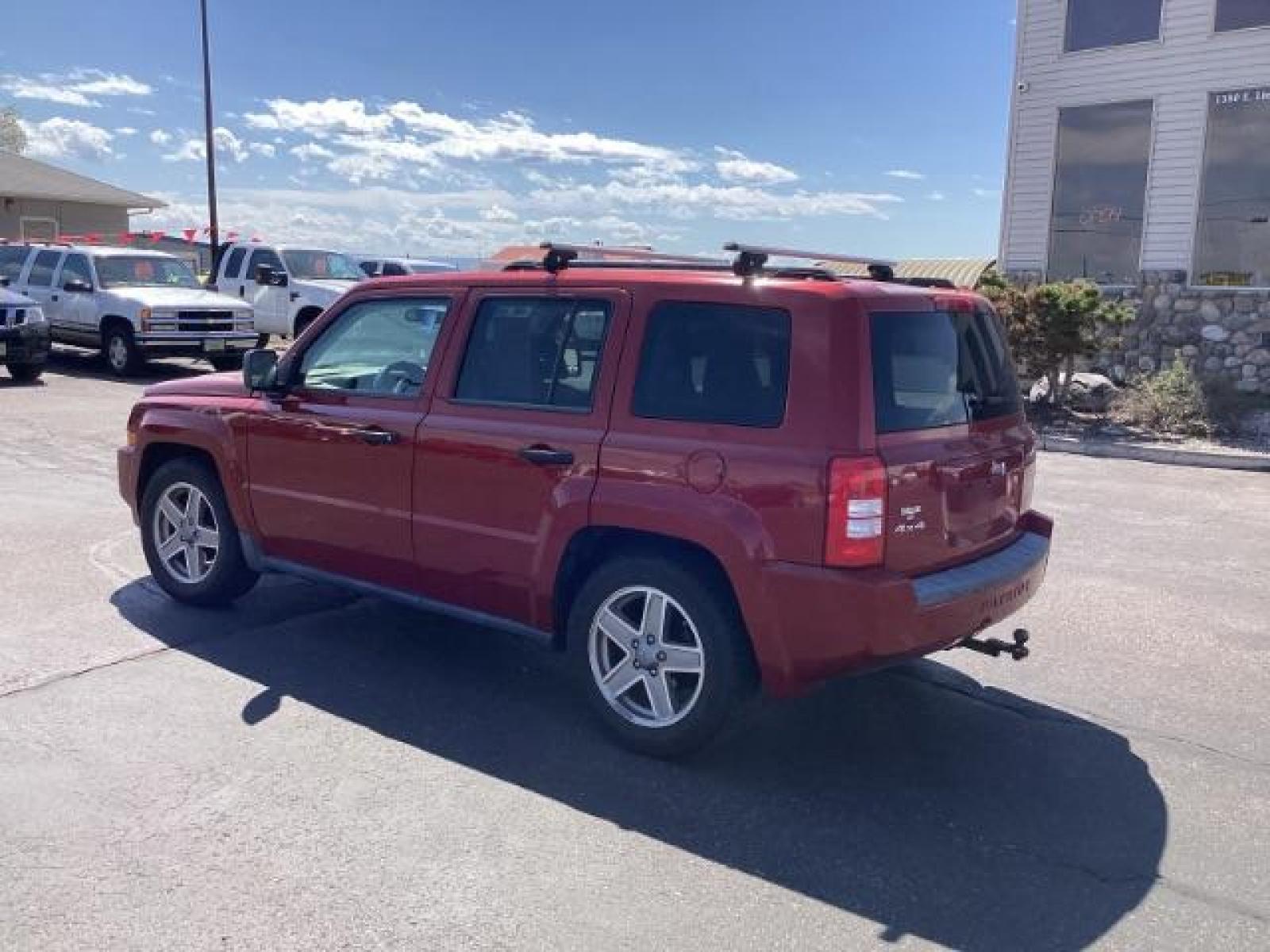 2008 Inferno Red Crystal Pearl /Dark Slate Gray Cloth Interior Jeep Patriot Sport 4WD (1J8FF28W28D) with an 2.4L L4 DOHC 16V engine, located at 1235 N Woodruff Ave., Idaho Falls, 83401, (208) 523-1053, 43.507172, -112.000488 - The 2008 Jeep Patriot Sport offers a combination of rugged styling, practicality, and capability. Here are some key features you can typically find in the 2008 Jeep Patriot Sport: Engine Options: The Patriot Sport typically comes with a choice of two engine options: 2.0-liter four-cylinder engine: - Photo #2