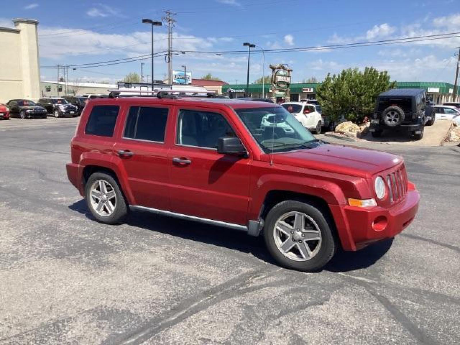 2008 Inferno Red Crystal Pearl /Dark Slate Gray Cloth Interior Jeep Patriot Sport 4WD (1J8FF28W28D) with an 2.4L L4 DOHC 16V engine, located at 1235 N Woodruff Ave., Idaho Falls, 83401, (208) 523-1053, 43.507172, -112.000488 - The 2008 Jeep Patriot Sport offers a combination of rugged styling, practicality, and capability. Here are some key features you can typically find in the 2008 Jeep Patriot Sport: Engine Options: The Patriot Sport typically comes with a choice of two engine options: 2.0-liter four-cylinder engine: - Photo #6