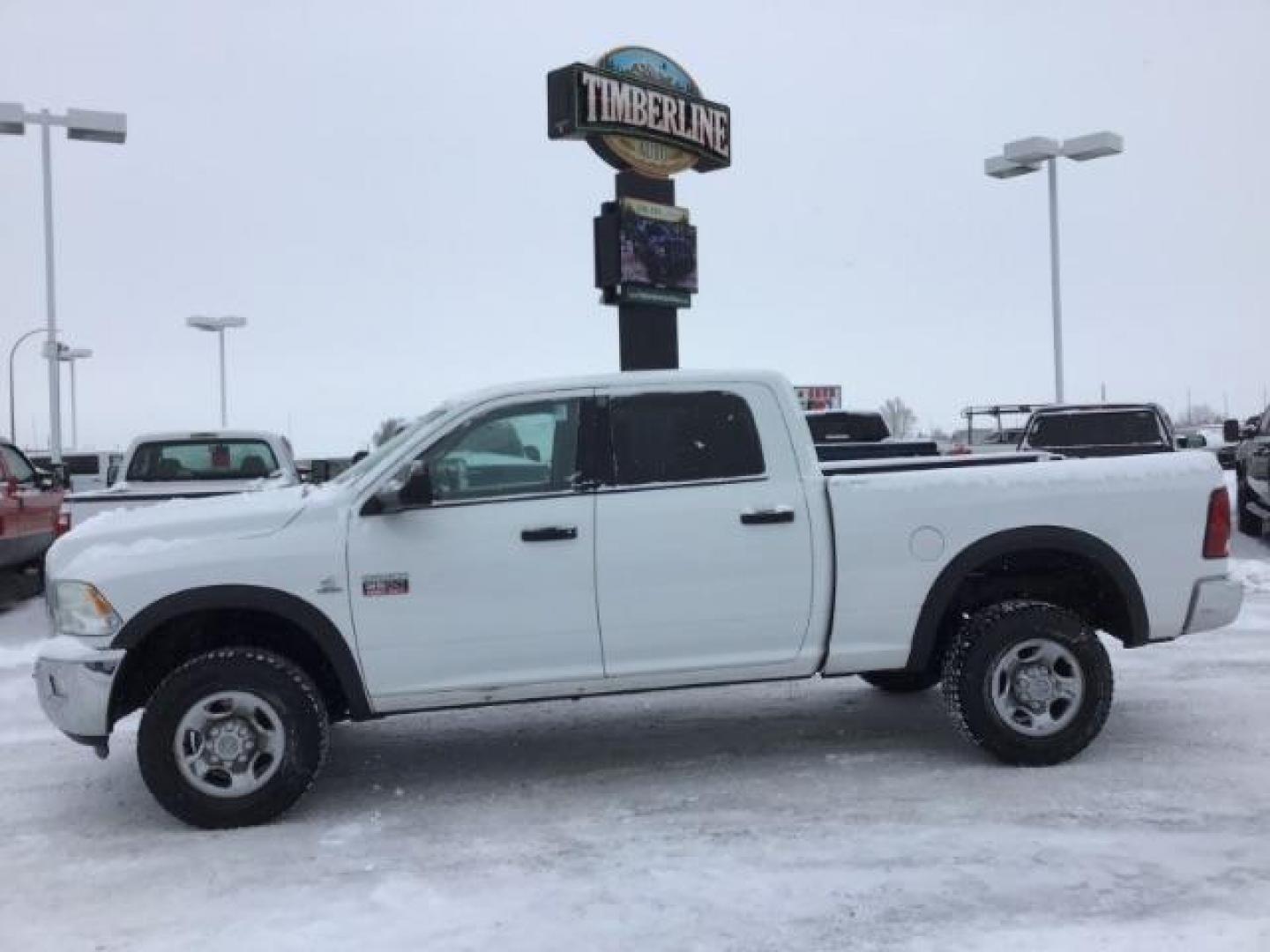 2012 Bright White /Dark Slate/Medium Graystone Cloth Interior RAM 3500 SLT Crew Cab SWB 4WD (3C63D3DLXCG) with an 6.7L L6 OHV 24V TURBO DIESEL engine, 6-Speed Automatic transmission, located at 1235 N Woodruff Ave., Idaho Falls, 83401, (208) 523-1053, 43.507172, -112.000488 - This 2012 Ram 3500 4x4 SLT, has the 6.7L diesel motor. It has 153,000 miles. Comes with cloth seats, AM/FM blue tooth stereo, power locks and windows. At Timberline Auto it is always easy to find a great deal on your next vehicle! Our experienced sales staff can help find the right vehicle that will - Photo#1