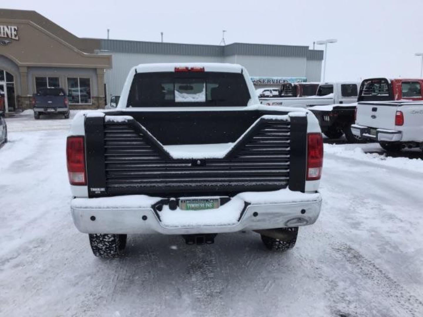 2012 Bright White /Dark Slate/Medium Graystone Cloth Interior RAM 3500 SLT Crew Cab SWB 4WD (3C63D3DLXCG) with an 6.7L L6 OHV 24V TURBO DIESEL engine, 6-Speed Automatic transmission, located at 1235 N Woodruff Ave., Idaho Falls, 83401, (208) 523-1053, 43.507172, -112.000488 - This 2012 Ram 3500 4x4 SLT, has the 6.7L diesel motor. It has 153,000 miles. Comes with cloth seats, AM/FM blue tooth stereo, power locks and windows. At Timberline Auto it is always easy to find a great deal on your next vehicle! Our experienced sales staff can help find the right vehicle that will - Photo#3