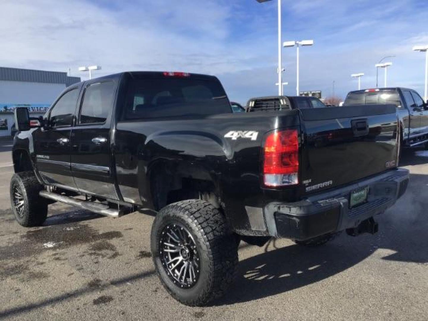 2012 Onyx Black /Ebony Leather Interior GMC Sierra 2500HD Denali Crew Cab 4WD (1GT125E8XCF) with an 6.6L V8 OHV 32V TURBO DIESEL engine, 6-Speed Automatic transmission, located at 1235 N Woodruff Ave., Idaho Falls, 83401, (208) 523-1053, 43.507172, -112.000488 - This 2012 GMC Denali 2500 4x4, has the 6.6L Duramax motor. It has 115,000 miles. It comes with Spray in Bed liner, heated seats, leather seats, sunroof, and Bose premium sound. At Timberline Auto it is always easy to find a great deal on your next vehicle! Our experienced sales staff can help find t - Photo#2