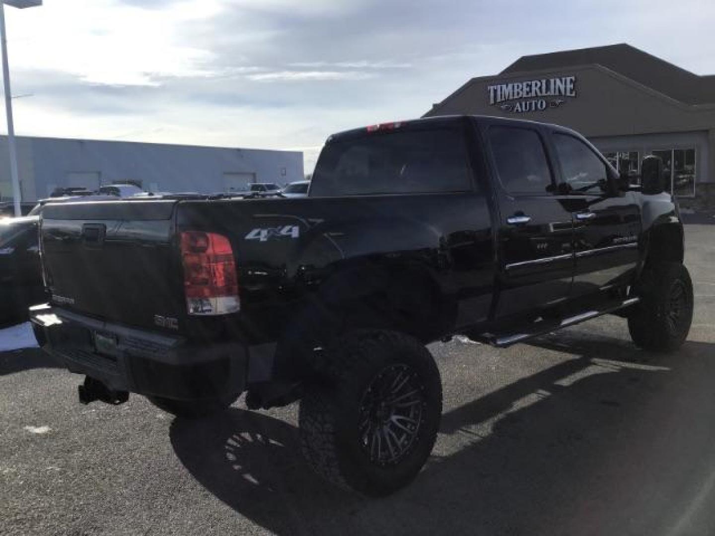 2012 Onyx Black /Ebony Leather Interior GMC Sierra 2500HD Denali Crew Cab 4WD (1GT125E8XCF) with an 6.6L V8 OHV 32V TURBO DIESEL engine, 6-Speed Automatic transmission, located at 1235 N Woodruff Ave., Idaho Falls, 83401, (208) 523-1053, 43.507172, -112.000488 - This 2012 GMC Denali 2500 4x4, has the 6.6L Duramax motor. It has 115,000 miles. It comes with Spray in Bed liner, heated seats, leather seats, sunroof, and Bose premium sound. At Timberline Auto it is always easy to find a great deal on your next vehicle! Our experienced sales staff can help find t - Photo#4