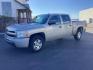 2009 pewter Chevrolet Silverado 1500 LS Crew Cab 4WD (3GCEK13C39G) with an 4.8L V8 OHV 16V engine, 4-Speed Automatic transmission, located at 1235 N Woodruff Ave., Idaho Falls, 83401, (208) 523-1053, 43.507172, -112.000488 - Photo#1