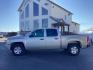 2009 pewter Chevrolet Silverado 1500 LS Crew Cab 4WD (3GCEK13C39G) with an 4.8L V8 OHV 16V engine, 4-Speed Automatic transmission, located at 1235 N Woodruff Ave., Idaho Falls, 83401, (208) 523-1053, 43.507172, -112.000488 - Photo#2