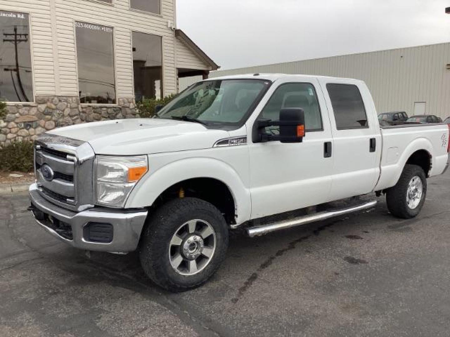 2014 Oxford White Ford F-350 SD XLT Crew Cab 4WD (1FT8W3B69EE) with an 6.2L V8 OHV 16V engine, 6-Speed Automatic transmission, located at 1235 N Woodruff Ave., Idaho Falls, 83401, (208) 523-1053, 43.507172, -112.000488 - Photo#1