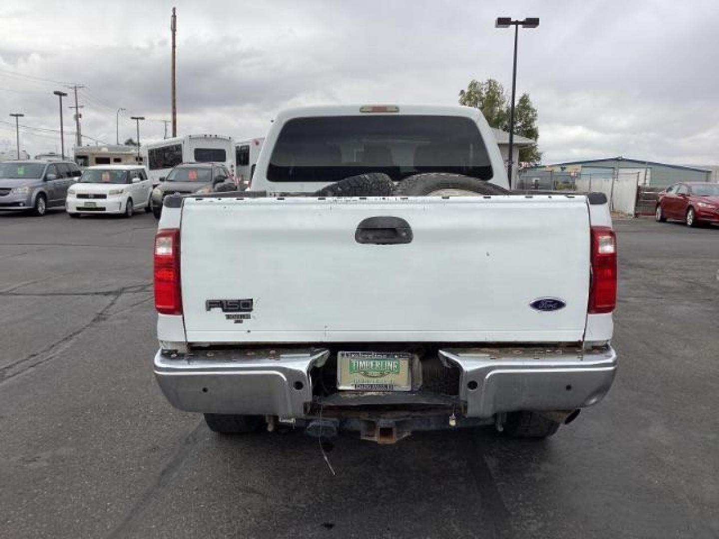 2014 Oxford White Ford F-350 SD XLT Crew Cab 4WD (1FT8W3B69EE) with an 6.2L V8 OHV 16V engine, 6-Speed Automatic transmission, located at 1235 N Woodruff Ave., Idaho Falls, 83401, (208) 523-1053, 43.507172, -112.000488 - Photo#4