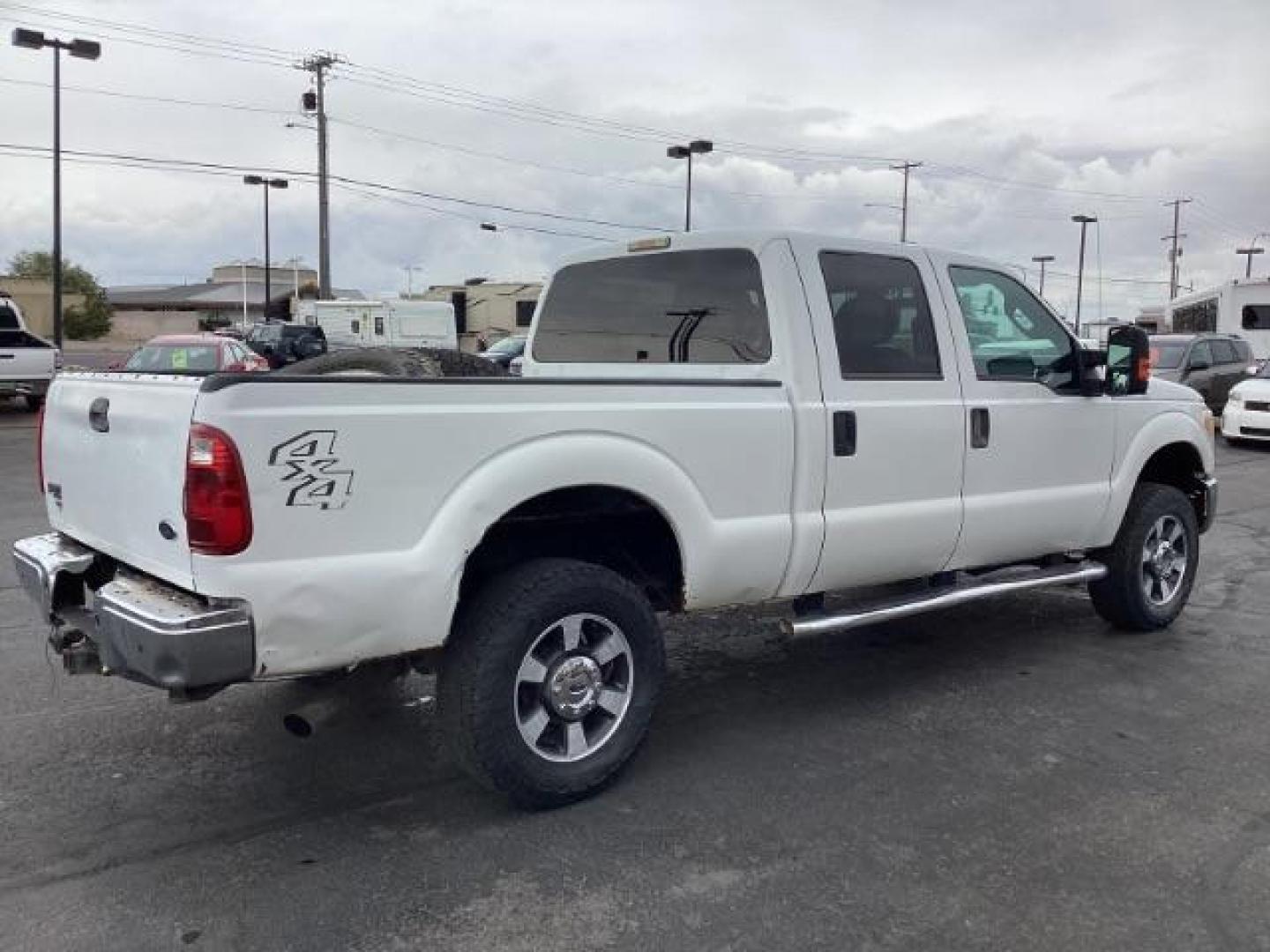 2014 Oxford White Ford F-350 SD XLT Crew Cab 4WD (1FT8W3B69EE) with an 6.2L V8 OHV 16V engine, 6-Speed Automatic transmission, located at 1235 N Woodruff Ave., Idaho Falls, 83401, (208) 523-1053, 43.507172, -112.000488 - Photo#5