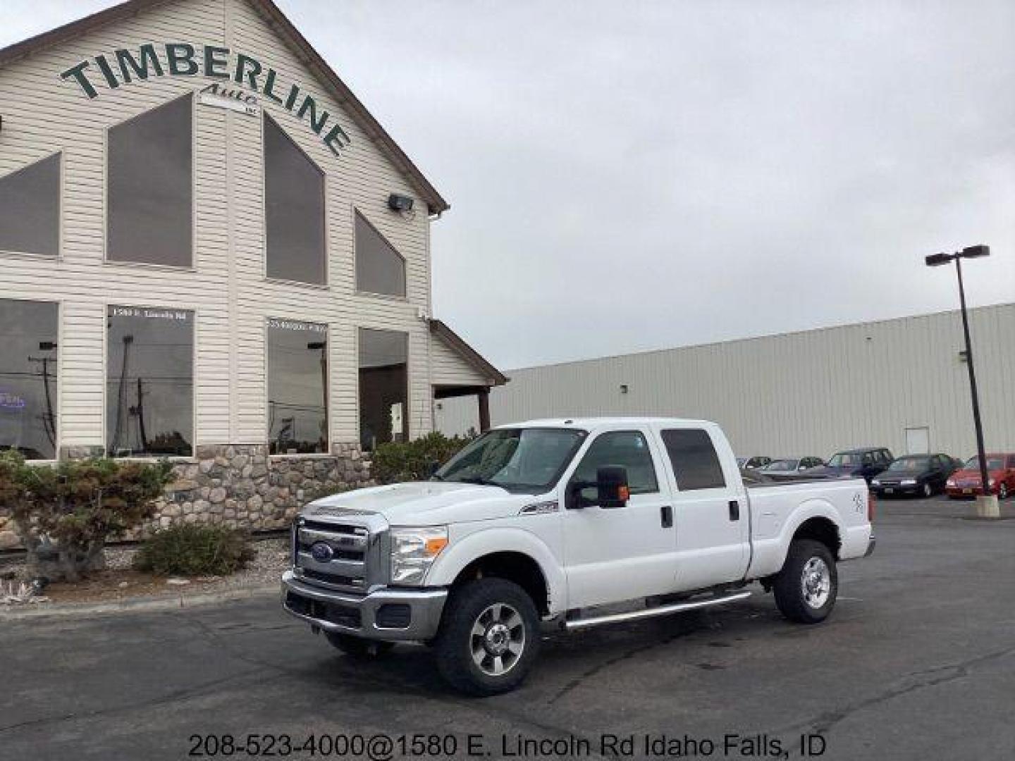 2014 Oxford White Ford F-350 SD XLT Crew Cab 4WD (1FT8W3B69EE) with an 6.2L V8 OHV 16V engine, 6-Speed Automatic transmission, located at 1235 N Woodruff Ave., Idaho Falls, 83401, (208) 523-1053, 43.507172, -112.000488 - Photo#0