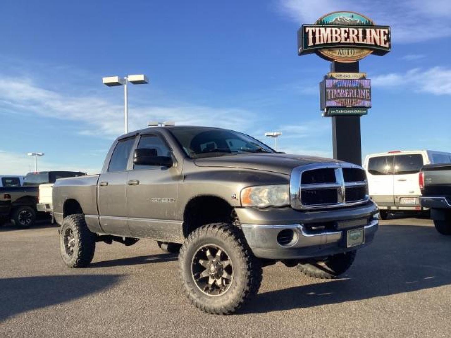 2004 Black /Dark Slate Gray Cloth Interior Dodge Ram 2500 SLT Quad Cab 4WD (3D7KU28C54G) with an 5.9L L6 OHV 24V TURBO DIESEL engine, AUTOMATIC transmission, located at 1235 N Woodruff Ave., Idaho Falls, 83401, (208) 523-1053, 43.507172, -112.000488 - Photo#0