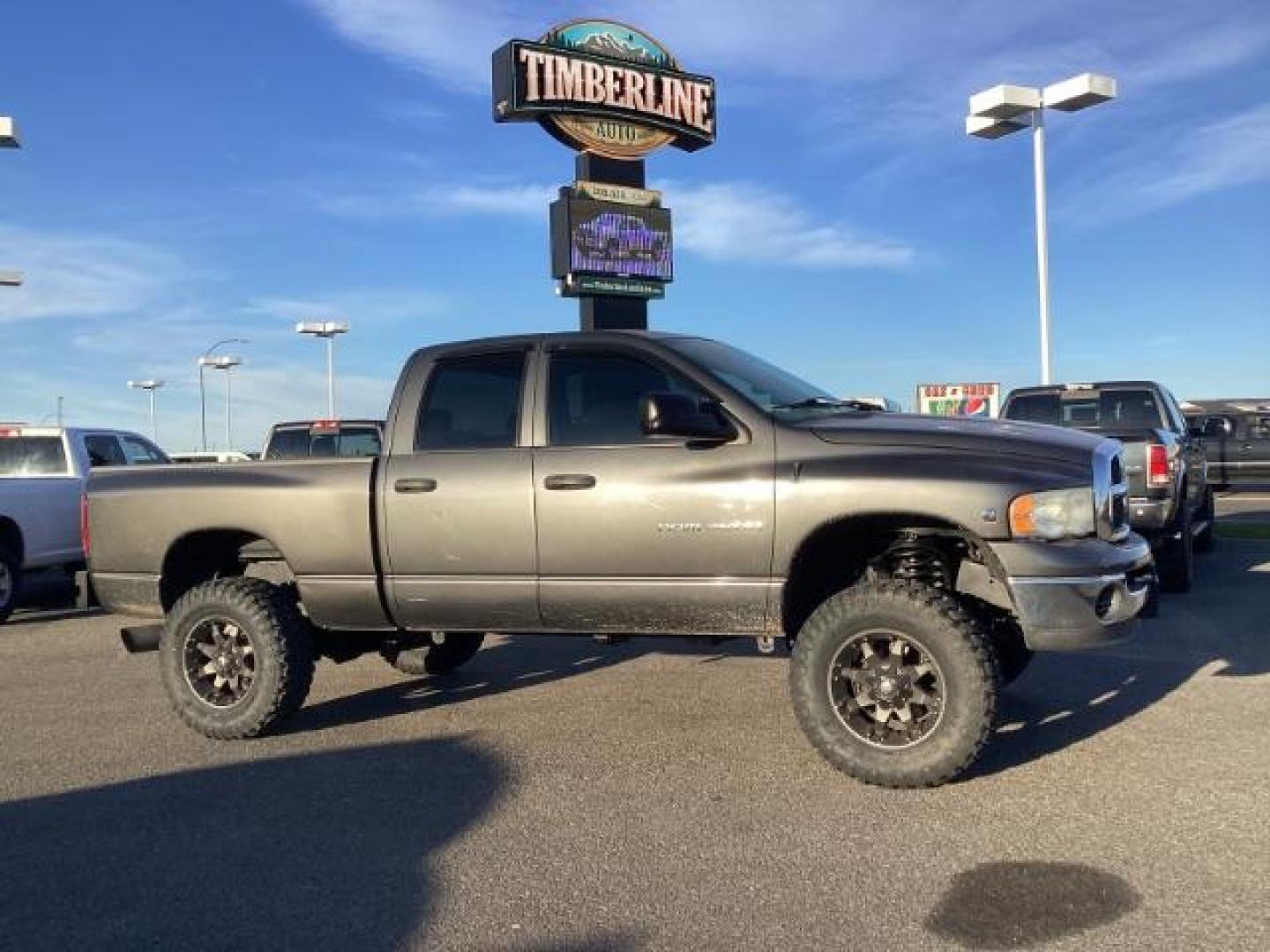 2004 Black /Dark Slate Gray Cloth Interior Dodge Ram 2500 SLT Quad Cab 4WD (3D7KU28C54G) with an 5.9L L6 OHV 24V TURBO DIESEL engine, AUTOMATIC transmission, located at 1235 N Woodruff Ave., Idaho Falls, 83401, (208) 523-1053, 43.507172, -112.000488 - Photo#1