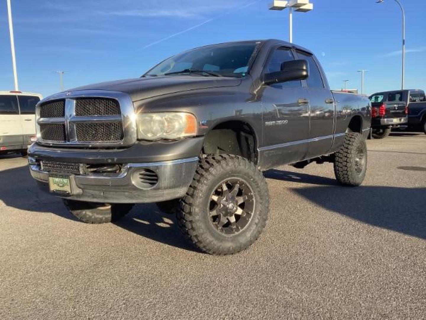 2004 Black /Dark Slate Gray Cloth Interior Dodge Ram 2500 SLT Quad Cab 4WD (3D7KU28C54G) with an 5.9L L6 OHV 24V TURBO DIESEL engine, AUTOMATIC transmission, located at 1235 N Woodruff Ave., Idaho Falls, 83401, (208) 523-1053, 43.507172, -112.000488 - Photo#2