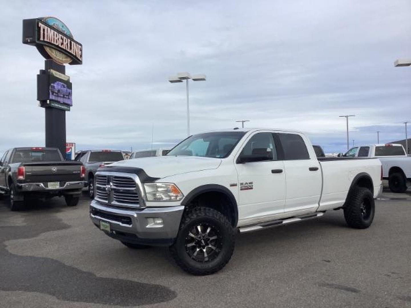 2013 Bright White Clearcoat /Diesel Gray/Black RAM 2500 SLT Crew Cab LWB 4WD (3C6TR5JT9DG) with an 5.7L V8 OHV 16V engine, 6-Speed Automatic transmission, located at 1235 N Woodruff Ave., Idaho Falls, 83401, (208) 523-1053, 43.507172, -112.000488 - New Inventory. Going thru service and inspection. Call for more pictures. At Timberline Auto it is always easy to find a great deal on your next vehicle! Our experienced sales staff can help find the right vehicle that will fit your needs. Our knowledgeable finance department has options for almost - Photo#0