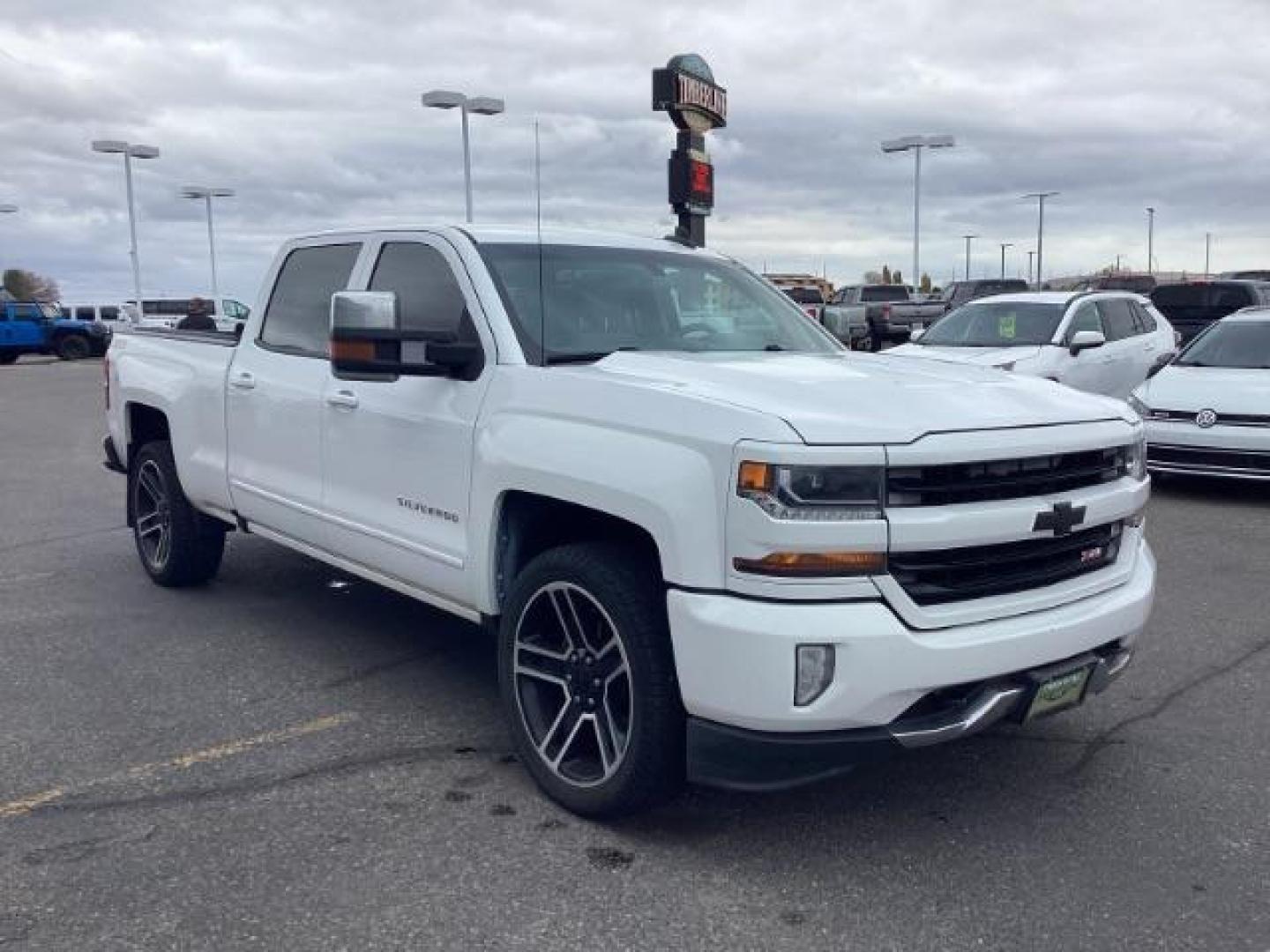 2016 Summit White /Jet Black, cloth Chevrolet Silverado 1500 LT Crew Cab 4WD (3GCUKREC7GG) with an 5.3L V8 OHV 16V engine, 6-Speed Automatic transmission, located at 1235 N Woodruff Ave., Idaho Falls, 83401, (208) 523-1053, 43.507172, -112.000488 - Photo#7