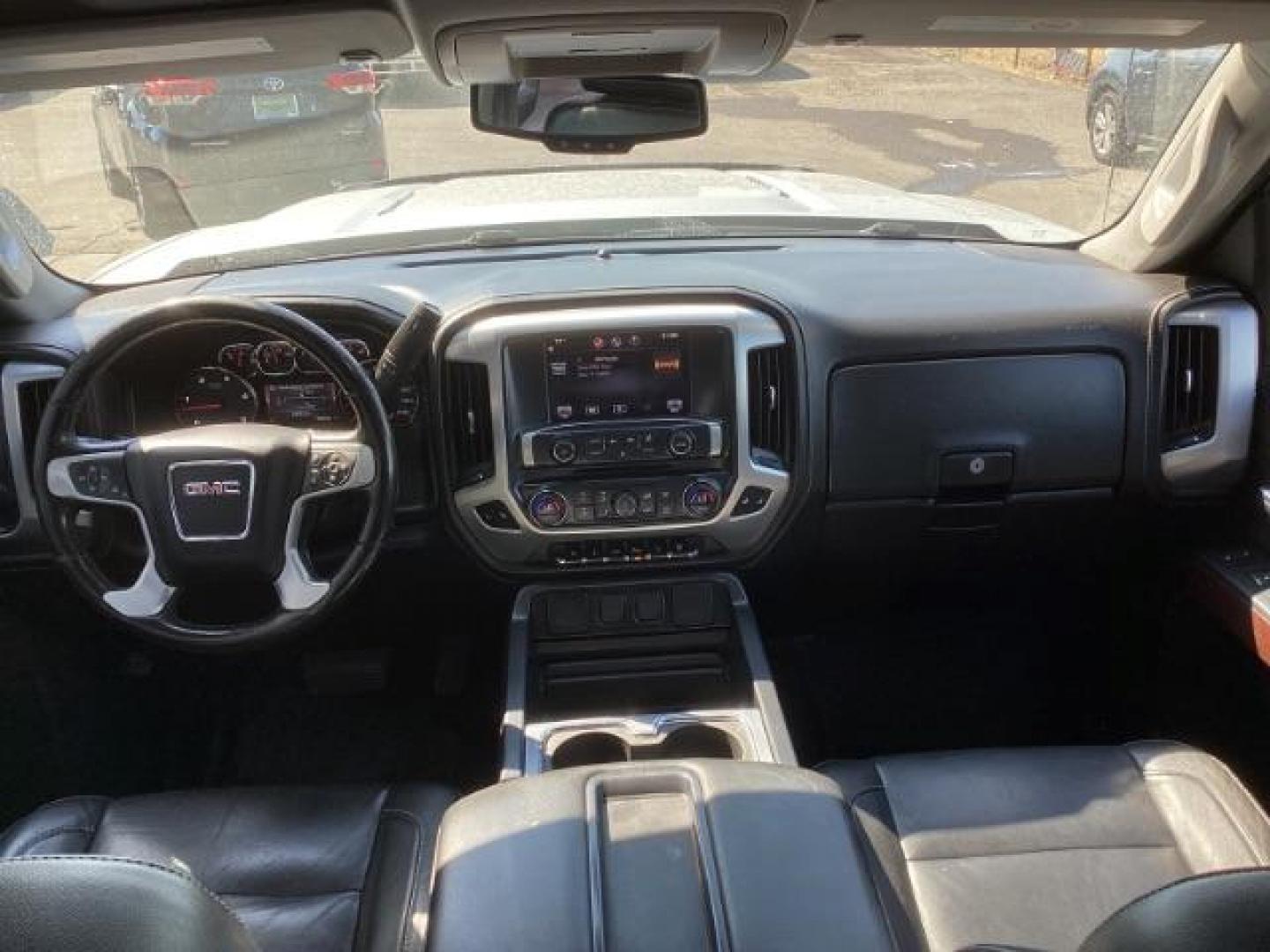 2015 Quicksilver Metallic /Jet Black GMC Sierra 2500HD SLT Crew Cab 4WD (1GT12ZE88FF) with an 6.6L V8 OHV 16V DIESEL engine, 6-Speed Automatic transmission, located at 1235 N Woodruff Ave., Idaho Falls, 83401, (208) 523-1053, 43.507172, -112.000488 - Photo#9