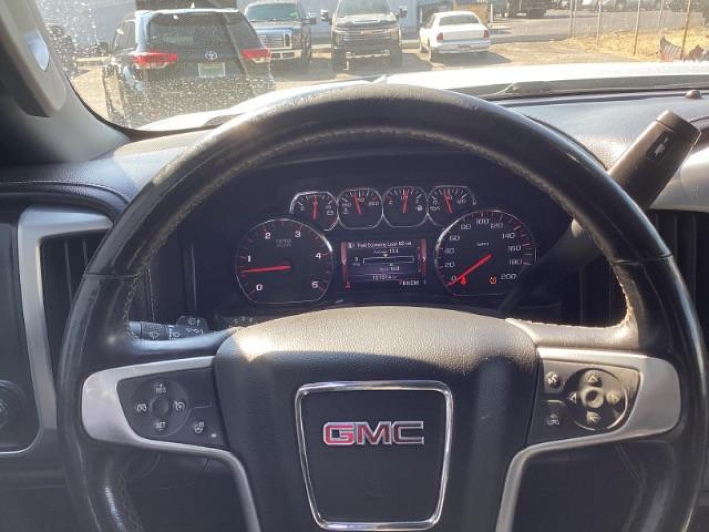 2015 Quicksilver Metallic /Jet Black GMC Sierra 2500HD SLT Crew Cab 4WD (1GT12ZE88FF) with an 6.6L V8 OHV 16V DIESEL engine, 6-Speed Automatic transmission, located at 1235 N Woodruff Ave., Idaho Falls, 83401, (208) 523-1053, 43.507172, -112.000488 - Photo#14