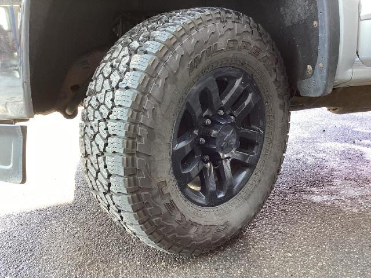 2015 Quicksilver Metallic /Jet Black GMC Sierra 2500HD SLT Crew Cab 4WD (1GT12ZE88FF) with an 6.6L V8 OHV 16V DIESEL engine, 6-Speed Automatic transmission, located at 1235 N Woodruff Ave., Idaho Falls, 83401, (208) 523-1053, 43.507172, -112.000488 - Photo#21