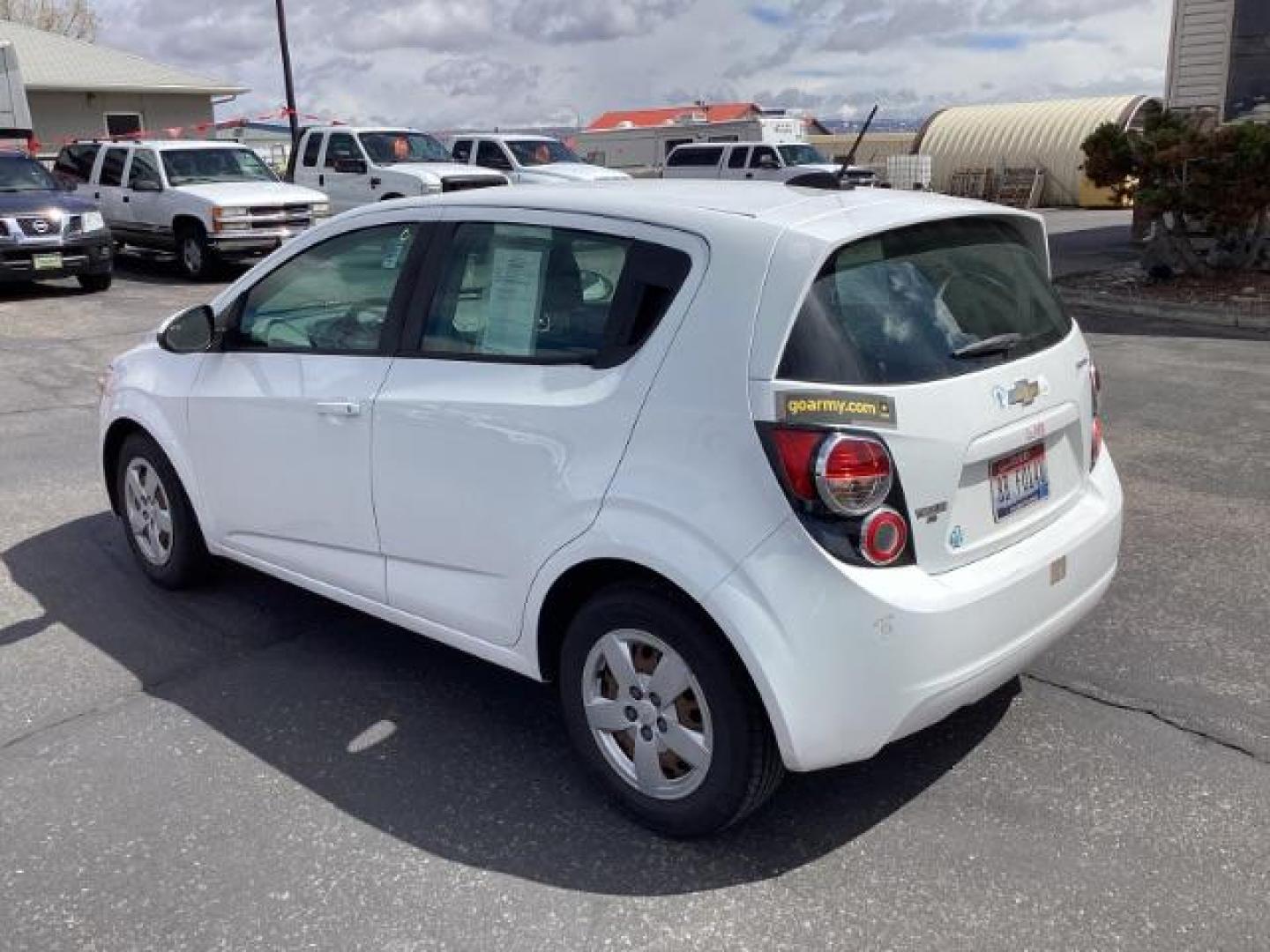 2016 Summit White Chevrolet Sonic LS Auto 5-Door (1G1JA6SH6G4) with an 1.8L L4 DOHC 24V engine, 6-Speed Automatic transmission, located at 1235 N Woodruff Ave., Idaho Falls, 83401, (208) 523-1053, 43.507172, -112.000488 - The 2016 Chevy Sonic LS is a compact car known for its fuel efficiency, nimble handling, and decent amount of standard features. Here's an overview of its key features: Engine Options: The Sonic LS typically comes with a 1.8-liter four-cylinder engine, although some models may have a turbocharged 1 - Photo#2