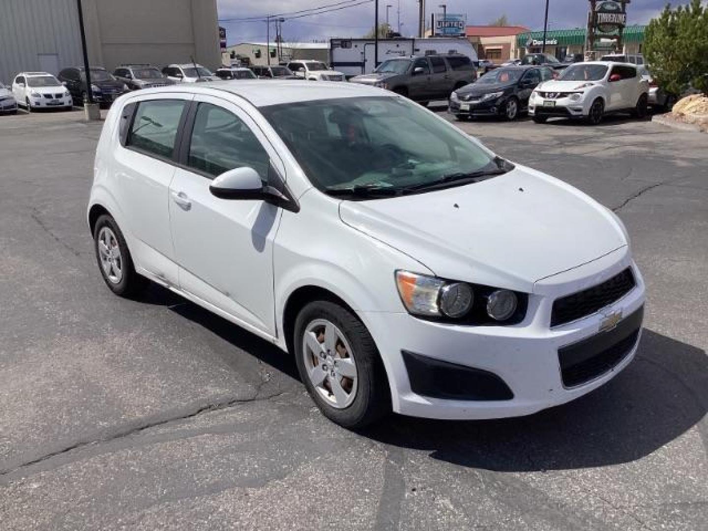 2016 Summit White Chevrolet Sonic LS Auto 5-Door (1G1JA6SH6G4) with an 1.8L L4 DOHC 24V engine, 6-Speed Automatic transmission, located at 1235 N Woodruff Ave., Idaho Falls, 83401, (208) 523-1053, 43.507172, -112.000488 - The 2016 Chevy Sonic LS is a compact car known for its fuel efficiency, nimble handling, and decent amount of standard features. Here's an overview of its key features: Engine Options: The Sonic LS typically comes with a 1.8-liter four-cylinder engine, although some models may have a turbocharged 1 - Photo#6