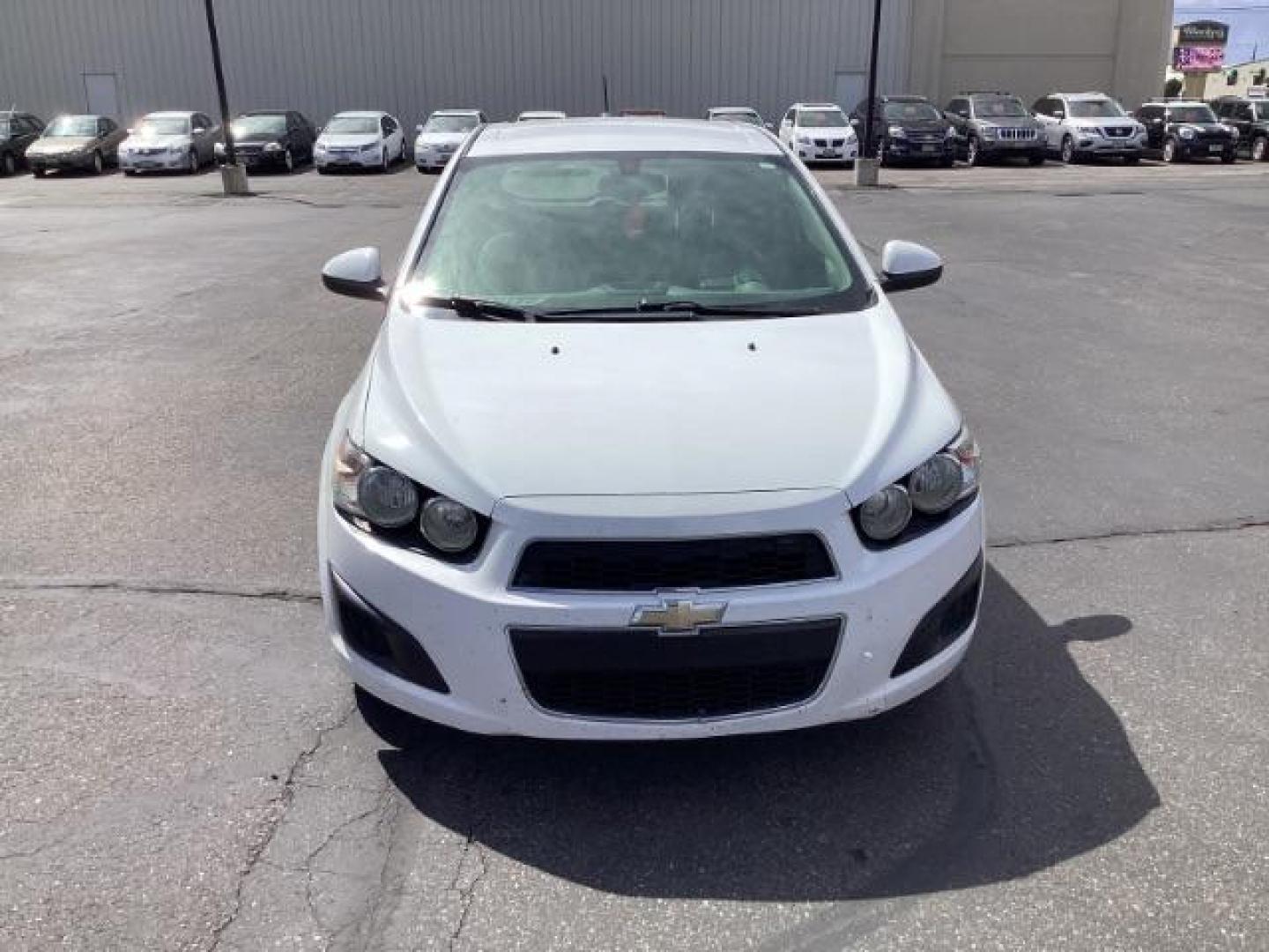 2016 Summit White Chevrolet Sonic LS Auto 5-Door (1G1JA6SH6G4) with an 1.8L L4 DOHC 24V engine, 6-Speed Automatic transmission, located at 1235 N Woodruff Ave., Idaho Falls, 83401, (208) 523-1053, 43.507172, -112.000488 - The 2016 Chevy Sonic LS is a compact car known for its fuel efficiency, nimble handling, and decent amount of standard features. Here's an overview of its key features: Engine Options: The Sonic LS typically comes with a 1.8-liter four-cylinder engine, although some models may have a turbocharged 1 - Photo#7