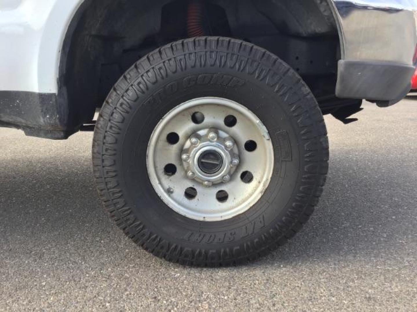 1999 Oxford White Clearcoat /Medium Graphite Cloth Ford F-250 SD XLT Crew Cab SWB 4WD (1FTNW21F4XE) with an 7.3L V8 OHV 16V TURBO DIESEL engine, 4-Speed Automatic transmission, located at 1235 N Woodruff Ave., Idaho Falls, 83401, (208) 523-1053, 43.507172, -112.000488 - This F-250 7.3L Powertstroke runs and drives very well! The body and paint are in good shape and the interior is in great condition! The tires are near new with 90% plus tread left. Your new pre-owned Ford diesel has a spray in bed liner, aftermarket trailer brake installed, 'A' pillar gauge pods, a - Photo#20