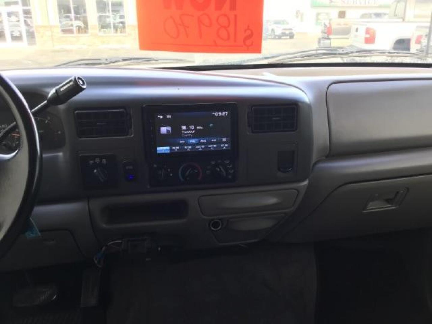 1999 Oxford White Clearcoat /Medium Graphite Cloth Ford F-250 SD XLT Crew Cab SWB 4WD (1FTNW21F4XE) with an 7.3L V8 OHV 16V TURBO DIESEL engine, 4-Speed Automatic transmission, located at 1235 N Woodruff Ave., Idaho Falls, 83401, (208) 523-1053, 43.507172, -112.000488 - This F-250 7.3L Powertstroke runs and drives very well! The body and paint are in good shape and the interior is in great condition! The tires are near new with 90% plus tread left. Your new pre-owned Ford diesel has a spray in bed liner, aftermarket trailer brake installed, 'A' pillar gauge pods, a - Photo#23