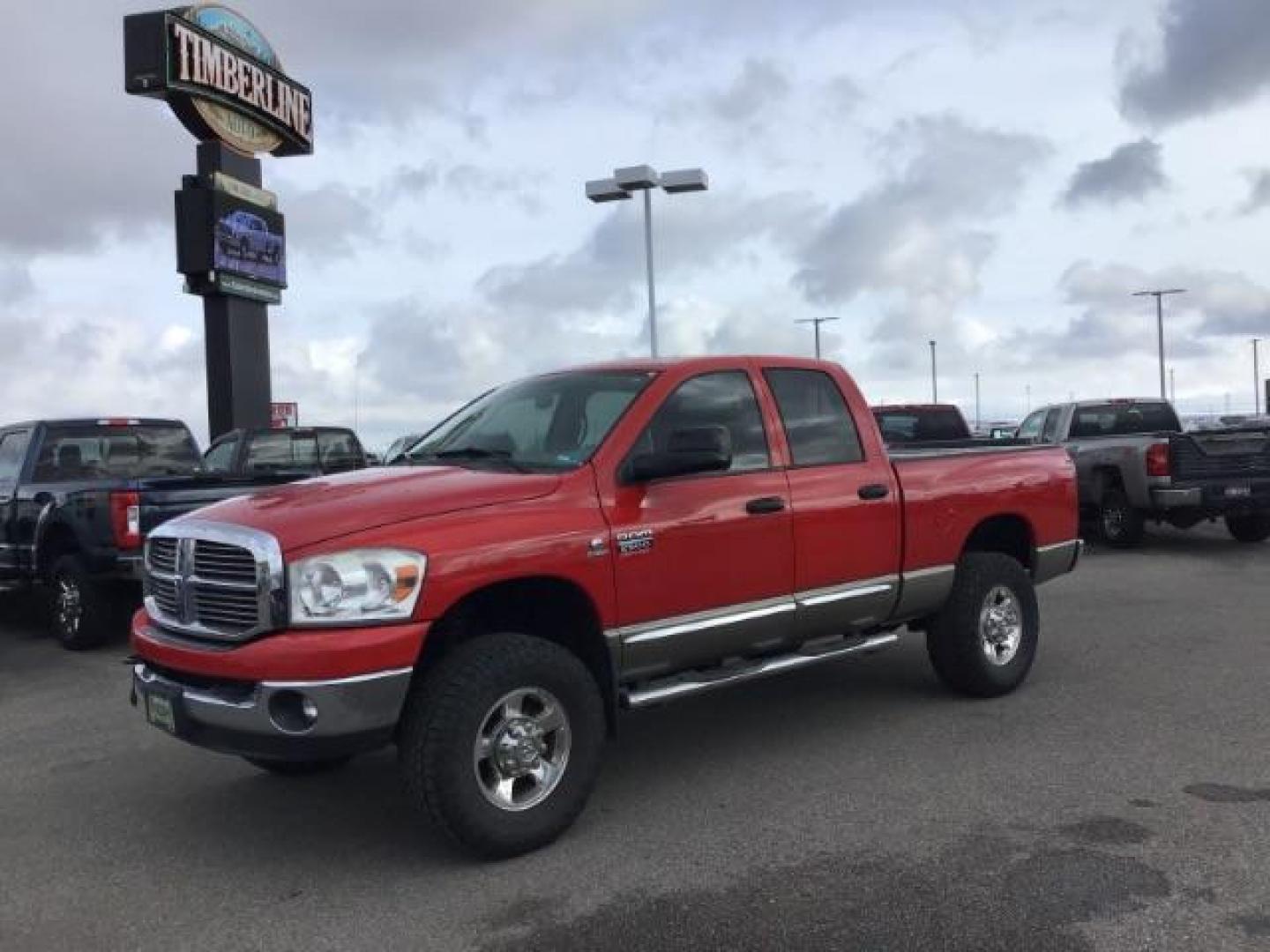 2009 Inferno Red Crystal Pearl Coat /Medium Slate Gray Cloth Interior Dodge Ram 2500 SLT Quad Cab SWB 4WD (3D7KS28L89G) with an 6.7L L6 OHV 24V TURBO DIESEL engine, 5-Speed Automatic transmission, located at 1235 N Woodruff Ave., Idaho Falls, 83401, (208) 523-1053, 43.507172, -112.000488 - This 2009 Dodge 2500 Bighorn 4x4, has the 6.7L diesel motor. It has 132,000 miles. Comes with cloth interior, power seat, keyless remote, power windows and locks, spray in bedliner, and AM/FM CD stereo. At Timberline Auto it is always easy to find a great deal on your next vehicle! Our experienced s - Photo#0