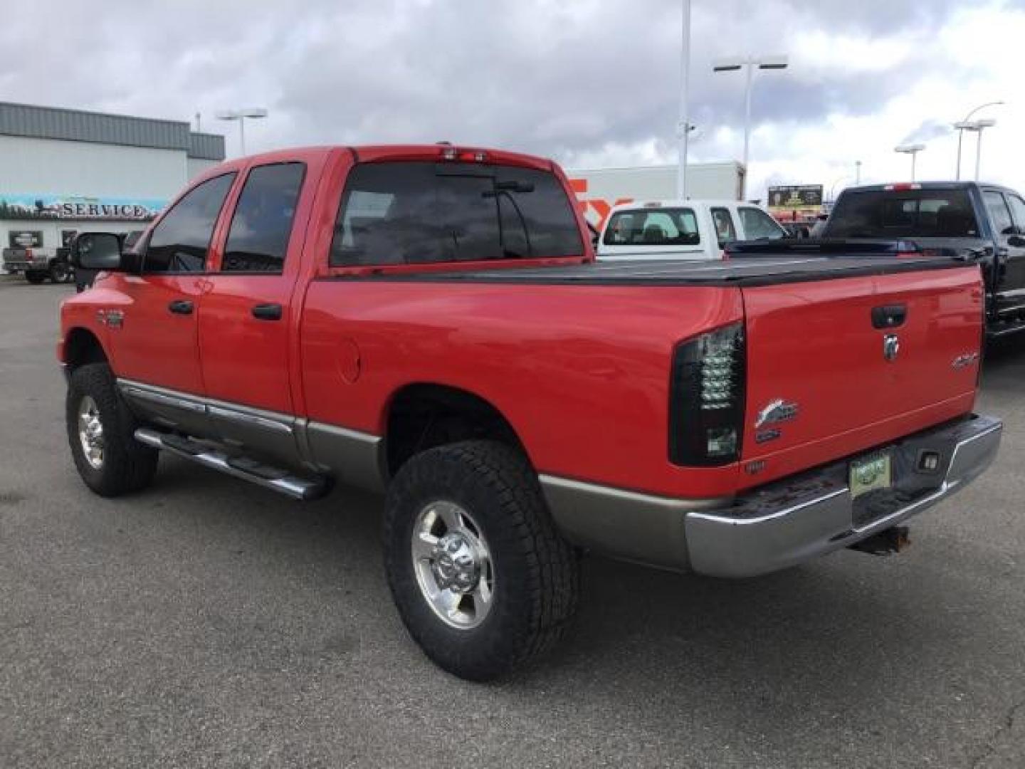 2009 Inferno Red Crystal Pearl Coat /Medium Slate Gray Cloth Interior Dodge Ram 2500 SLT Quad Cab SWB 4WD (3D7KS28L89G) with an 6.7L L6 OHV 24V TURBO DIESEL engine, 5-Speed Automatic transmission, located at 1235 N Woodruff Ave., Idaho Falls, 83401, (208) 523-1053, 43.507172, -112.000488 - This 2009 Dodge 2500 Bighorn 4x4, has the 6.7L diesel motor. It has 132,000 miles. Comes with cloth interior, power seat, keyless remote, power windows and locks, spray in bedliner, and AM/FM CD stereo. At Timberline Auto it is always easy to find a great deal on your next vehicle! Our experienced s - Photo#2