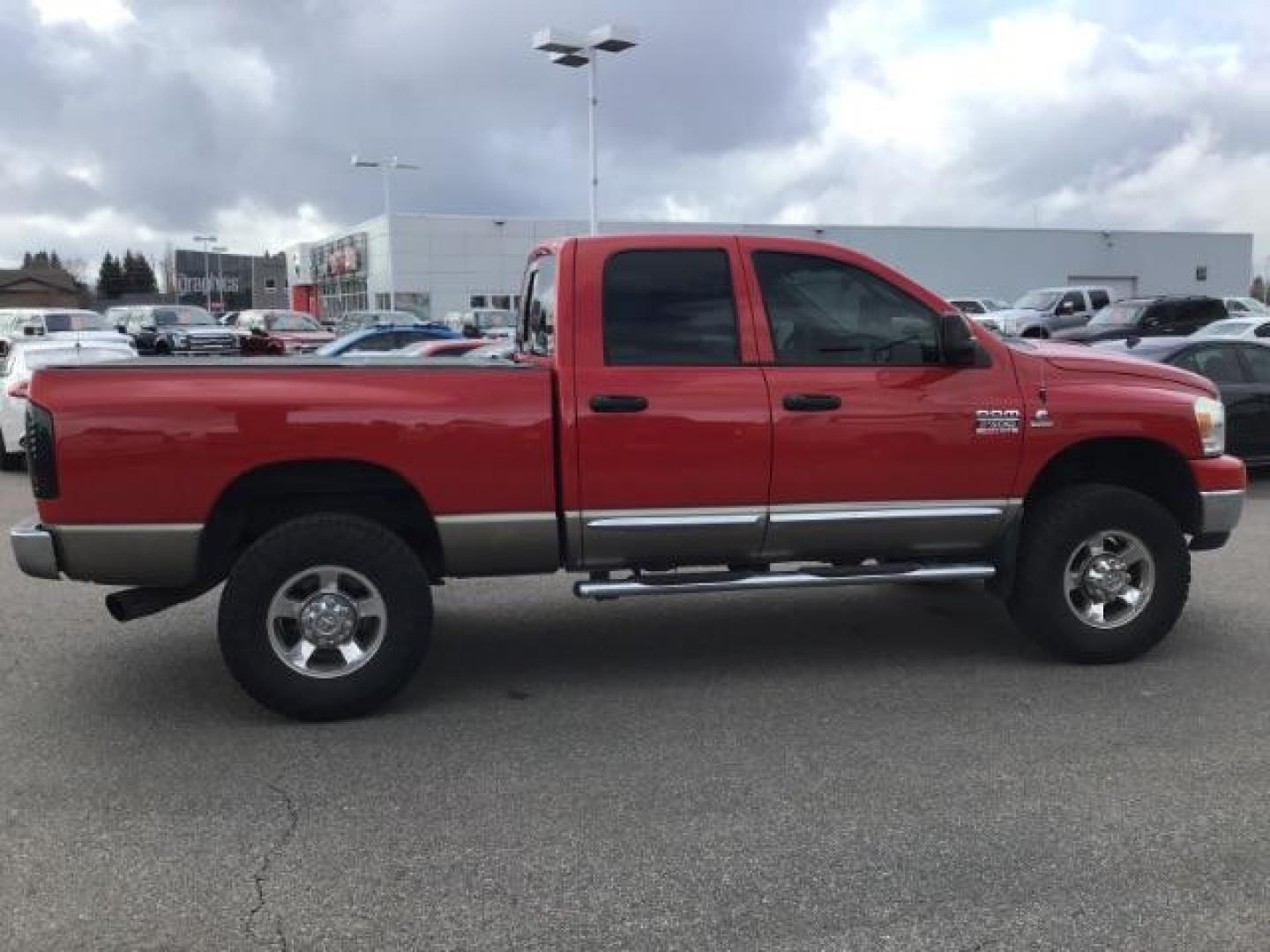 2009 Inferno Red Crystal Pearl Coat /Medium Slate Gray Cloth Interior Dodge Ram 2500 SLT Quad Cab SWB 4WD (3D7KS28L89G) with an 6.7L L6 OHV 24V TURBO DIESEL engine, 5-Speed Automatic transmission, located at 1235 N Woodruff Ave., Idaho Falls, 83401, (208) 523-1053, 43.507172, -112.000488 - This 2009 Dodge 2500 Bighorn 4x4, has the 6.7L diesel motor. It has 132,000 miles. Comes with cloth interior, power seat, keyless remote, power windows and locks, spray in bedliner, and AM/FM CD stereo. At Timberline Auto it is always easy to find a great deal on your next vehicle! Our experienced s - Photo#5