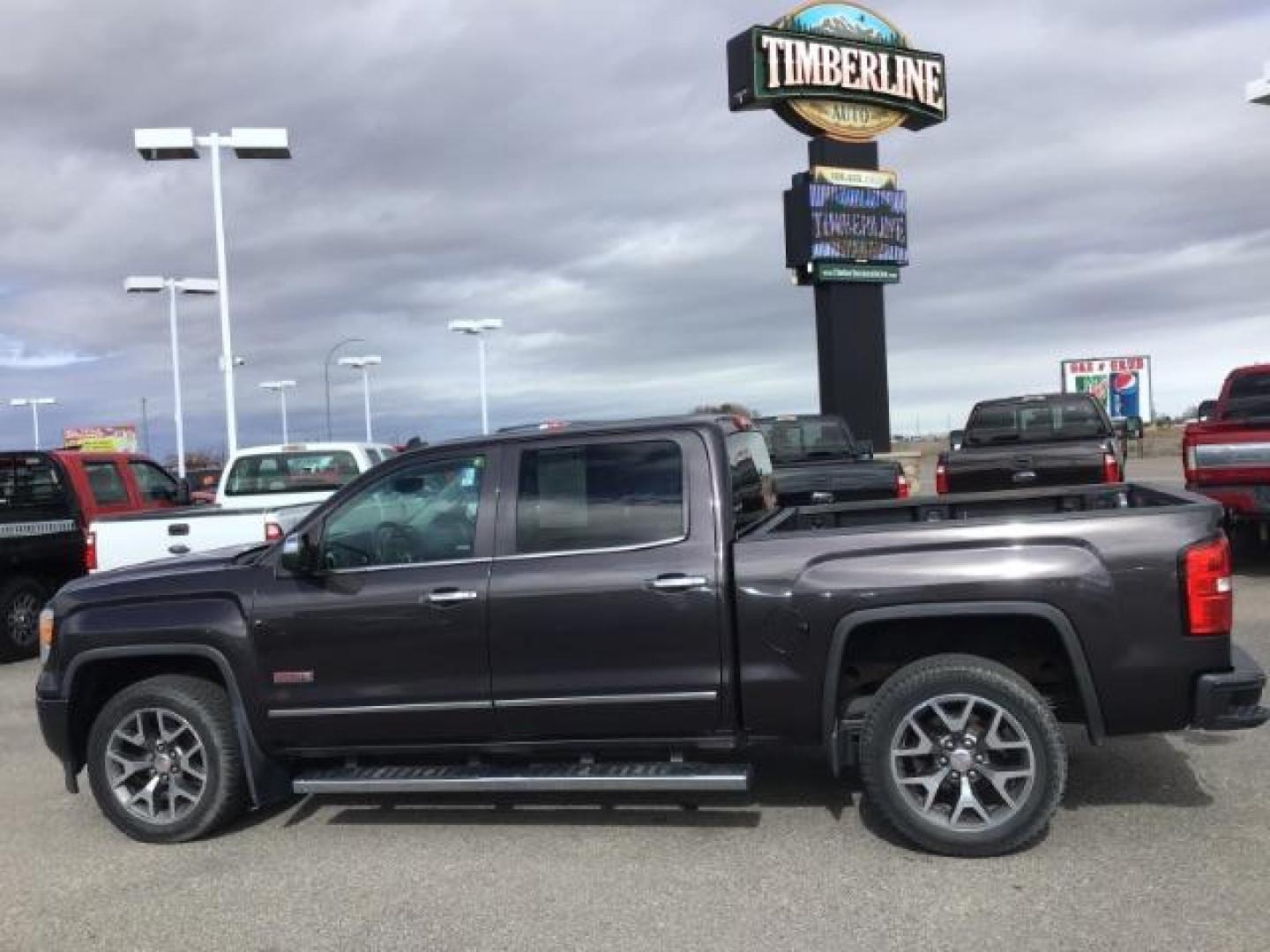 2014 Onyx Black /Jet Black GMC Sierra 1500 SLE Crew Cab 4WD (3GTU2UEC9EG) with an 5.3L V8 OHV 16V engine, 6-Speed Automatic transmission, located at 1235 N Woodruff Ave., Idaho Falls, 83401, (208) 523-1053, 43.507172, -112.000488 - This 2014 GMC 1500 SLE 4x4, has the 5.3L motor. It has 136,000 miles. It comes with cloth seats, heated seats, blue tooth audio, touch screen stereo, back up camera, cruise control, and power windows and locks. At Timberline Auto it is always easy to find a great deal on your next vehicle! Our exper - Photo#1