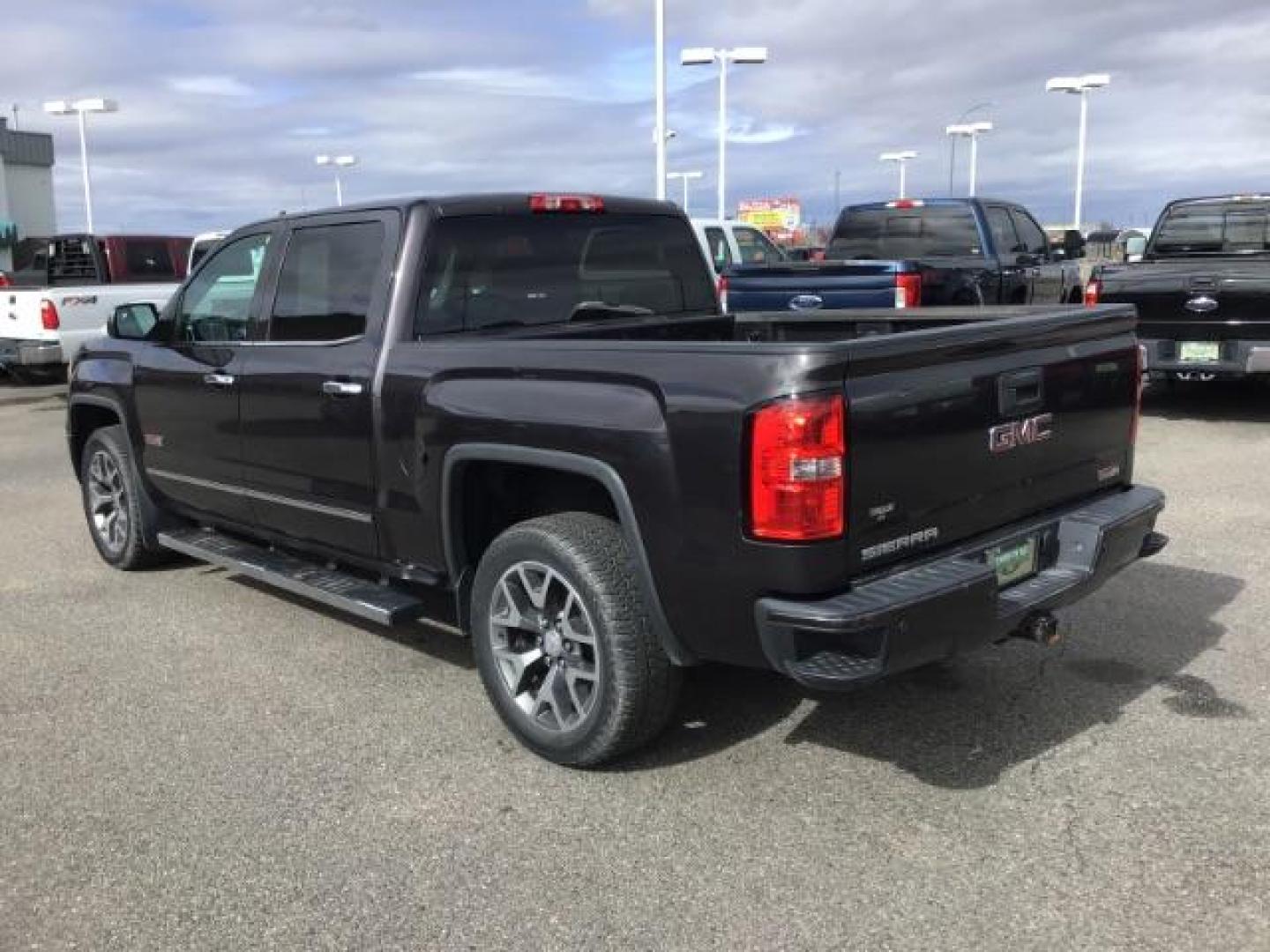 2014 Onyx Black /Jet Black GMC Sierra 1500 SLE Crew Cab 4WD (3GTU2UEC9EG) with an 5.3L V8 OHV 16V engine, 6-Speed Automatic transmission, located at 1235 N Woodruff Ave., Idaho Falls, 83401, (208) 523-1053, 43.507172, -112.000488 - This 2014 GMC 1500 SLE 4x4, has the 5.3L motor. It has 136,000 miles. It comes with cloth seats, heated seats, blue tooth audio, touch screen stereo, back up camera, cruise control, and power windows and locks. At Timberline Auto it is always easy to find a great deal on your next vehicle! Our exper - Photo#2