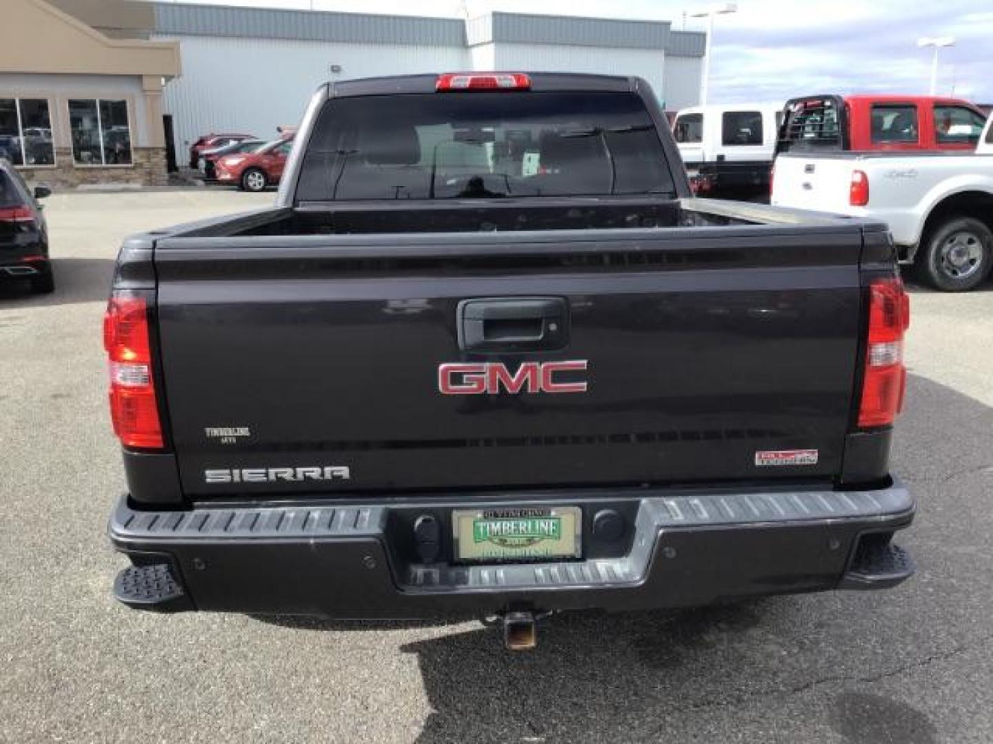 2014 Onyx Black /Jet Black GMC Sierra 1500 SLE Crew Cab 4WD (3GTU2UEC9EG) with an 5.3L V8 OHV 16V engine, 6-Speed Automatic transmission, located at 1235 N Woodruff Ave., Idaho Falls, 83401, (208) 523-1053, 43.507172, -112.000488 - This 2014 GMC 1500 SLE 4x4, has the 5.3L motor. It has 136,000 miles. It comes with cloth seats, heated seats, blue tooth audio, touch screen stereo, back up camera, cruise control, and power windows and locks. At Timberline Auto it is always easy to find a great deal on your next vehicle! Our exper - Photo#3