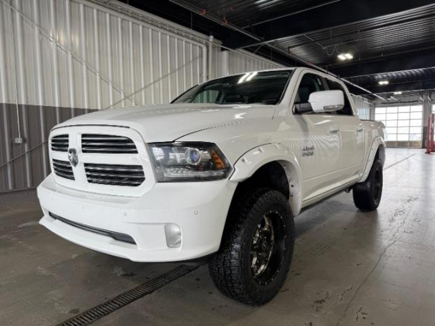 2014 WHITE /Black RAM 1500 Sport Crew Cab SWB 4WD (1C6RR7MT1ES) with an 5.7L V8 OHV 16V engine, 8-Speed Automatic transmission, located at 1235 N Woodruff Ave., Idaho Falls, 83401, (208) 523-1053, 43.507172, -112.000488 - Photo#0