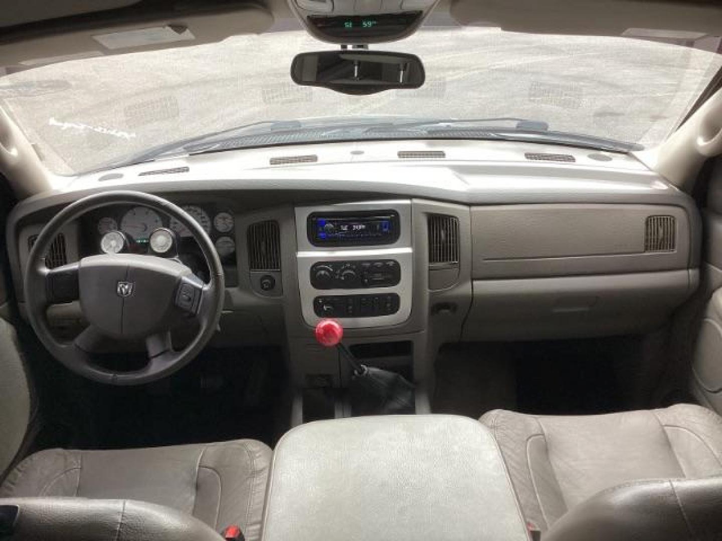 2004 Black /Dark Slate Gray Leather Interior Dodge Ram 2500 Laramie Quad Cab 4WD (3D7KU28C44G) with an 5.9L L6 OHV 24V TURBO DIESEL engine, 5-Speed Manual transmission, located at 1235 N Woodruff Ave., Idaho Falls, 83401, (208) 523-1053, 43.507172, -112.000488 - Photo#12