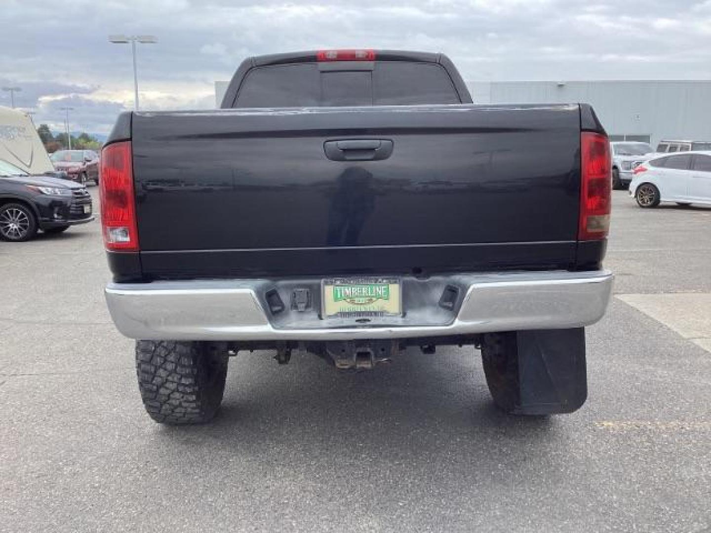 2004 Black /Dark Slate Gray Leather Interior Dodge Ram 2500 Laramie Quad Cab 4WD (3D7KU28C44G) with an 5.9L L6 OHV 24V TURBO DIESEL engine, 5-Speed Manual transmission, located at 1235 N Woodruff Ave., Idaho Falls, 83401, (208) 523-1053, 43.507172, -112.000488 - Photo#4