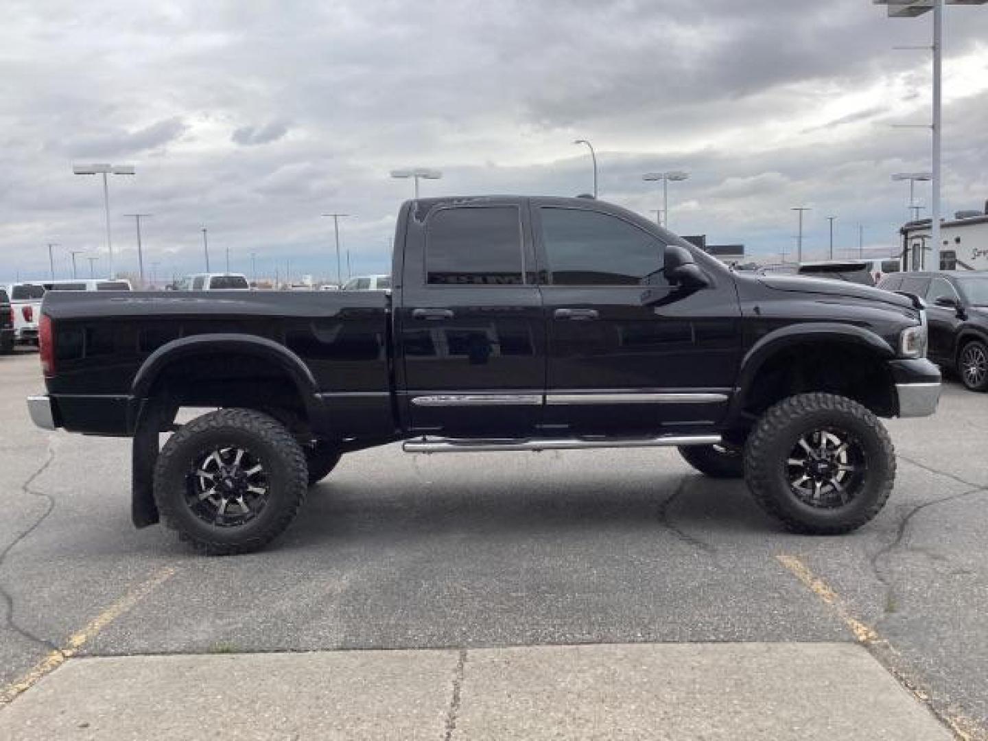 2004 Black /Dark Slate Gray Leather Interior Dodge Ram 2500 Laramie Quad Cab 4WD (3D7KU28C44G) with an 5.9L L6 OHV 24V TURBO DIESEL engine, 5-Speed Manual transmission, located at 1235 N Woodruff Ave., Idaho Falls, 83401, (208) 523-1053, 43.507172, -112.000488 - Photo#6