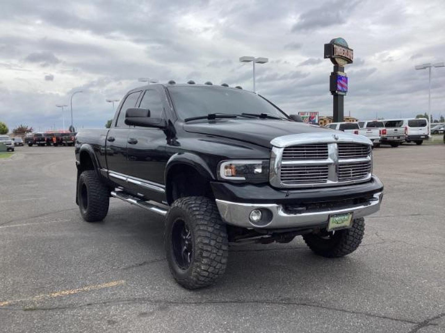 2004 Black /Dark Slate Gray Leather Interior Dodge Ram 2500 Laramie Quad Cab 4WD (3D7KU28C44G) with an 5.9L L6 OHV 24V TURBO DIESEL engine, 5-Speed Manual transmission, located at 1235 N Woodruff Ave., Idaho Falls, 83401, (208) 523-1053, 43.507172, -112.000488 - Photo#7