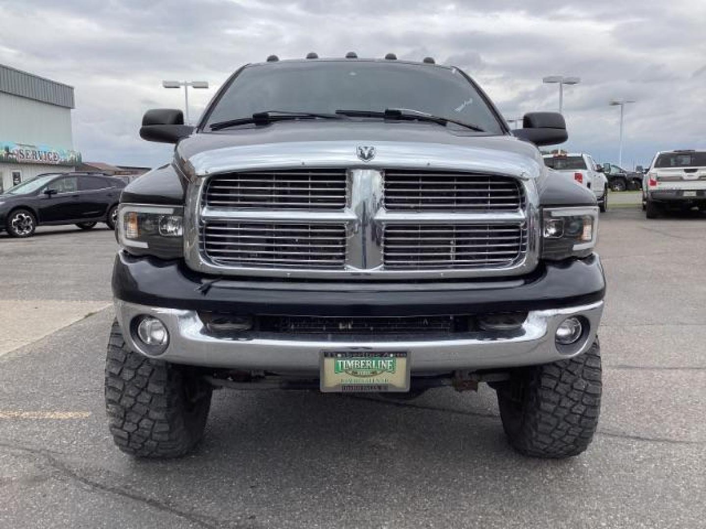 2004 Black /Dark Slate Gray Leather Interior Dodge Ram 2500 Laramie Quad Cab 4WD (3D7KU28C44G) with an 5.9L L6 OHV 24V TURBO DIESEL engine, 5-Speed Manual transmission, located at 1235 N Woodruff Ave., Idaho Falls, 83401, (208) 523-1053, 43.507172, -112.000488 - Photo#8