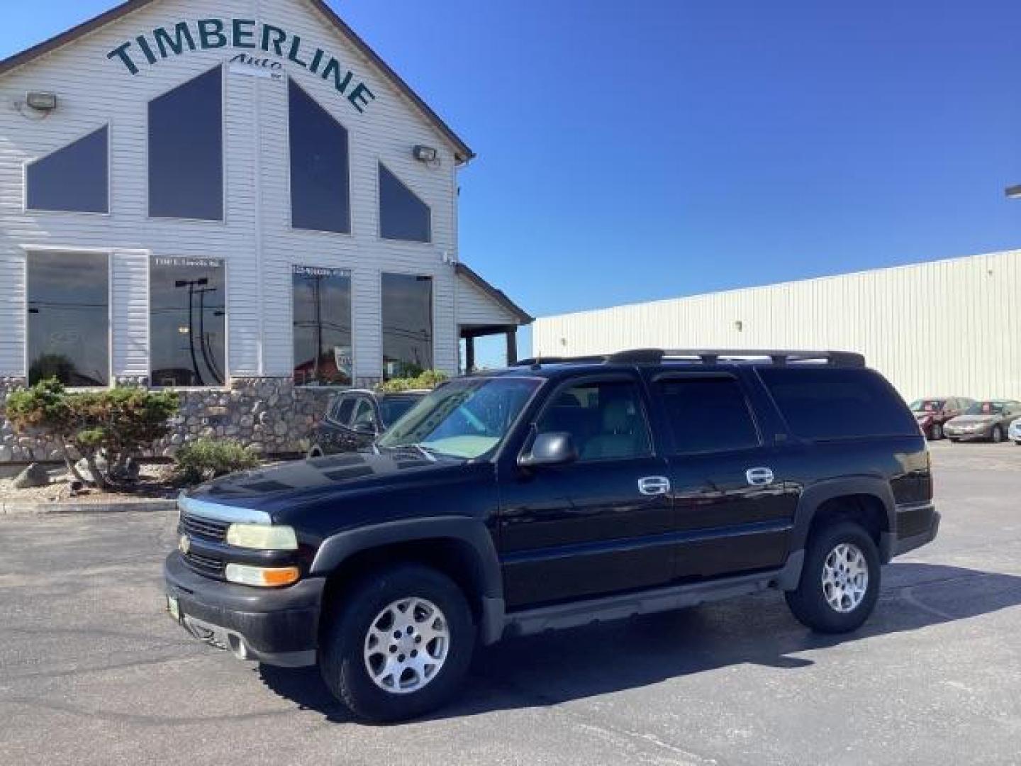 2004 Black /Gray/Dark Charcoal Leather Interior Chevrolet Suburban 1500 4WD (3GNFK16Z64G) with an 5.3L V8 OHV 16V FFV engine, 4-Speed Automatic transmission, located at 1235 N Woodruff Ave., Idaho Falls, 83401, (208) 523-1053, 43.507172, -112.000488 - The 2004 Chevrolet Suburban Z71 is a full-size SUV known for its robust performance, off-road capability, and spacious interior. Here are the key features of the 2004 Chevrolet Suburban Z71: Engine and Performance Engine: 5.3-liter V8 engine Horsepower: 295 hp @ 5,200 rpm Torque: 330 lb-ft @ 4,000 - Photo#0