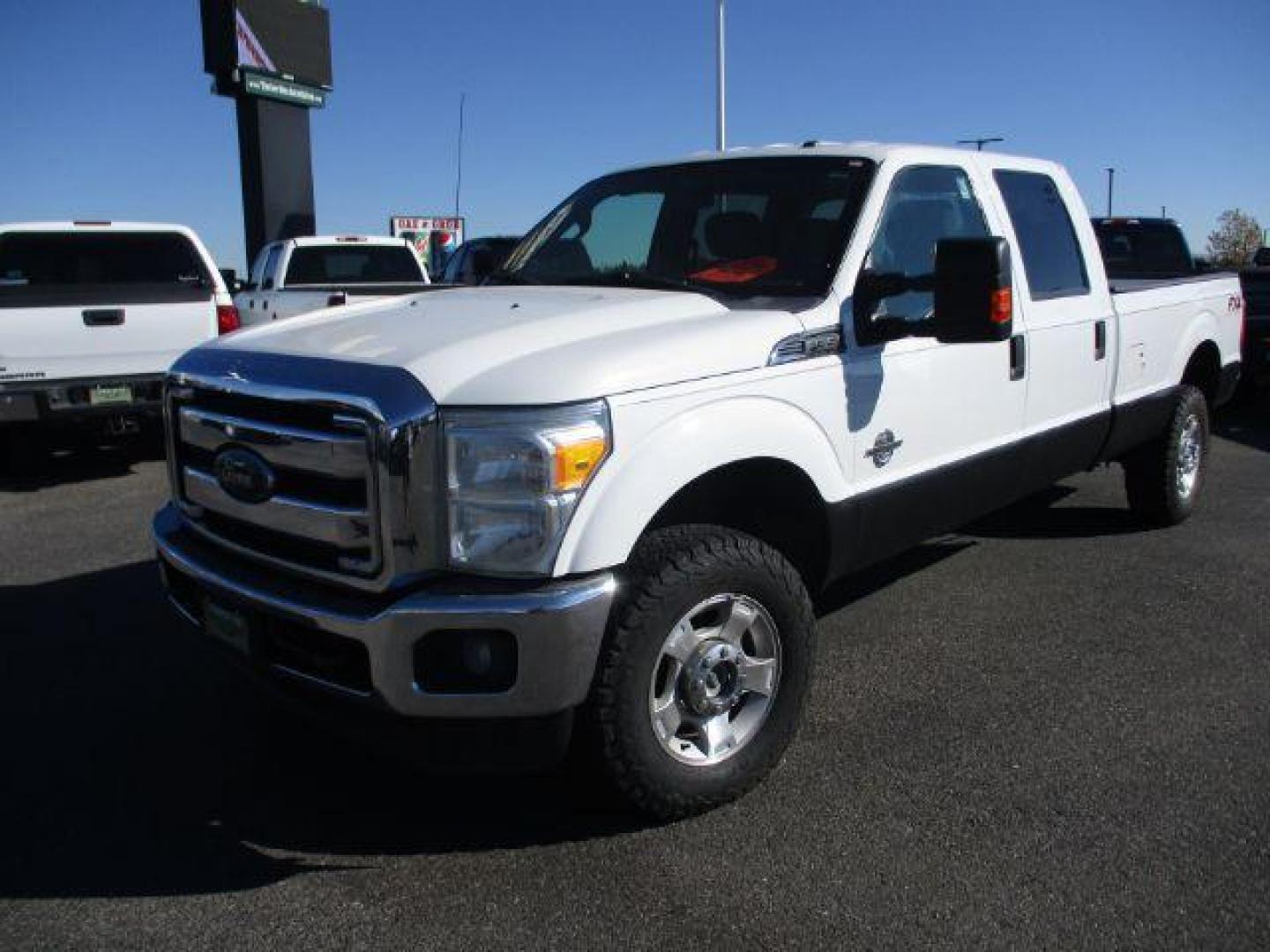 2015 Oxford White /Gray, cloth Ford F-350 SD XLT Crew Cab Long Bed 4WD (1FT8W3BT9FE) with an 6.7L V8 OHV 16V DIESEL engine, 6-Speed Automatic transmission, located at 1235 N Woodruff Ave., Idaho Falls, 83401, (208) 523-1053, 43.507172, -112.000488 - This long bed diesel comes in the FX4 package, newer tires with 80% tread left, tow mirrors, vinyl flooring, exhaust brake and more! These SuperCrews have all the leg room you need and them some! They are perfect for work crews or families! At timberline Auto it is always easy to find a great deal o - Photo#1