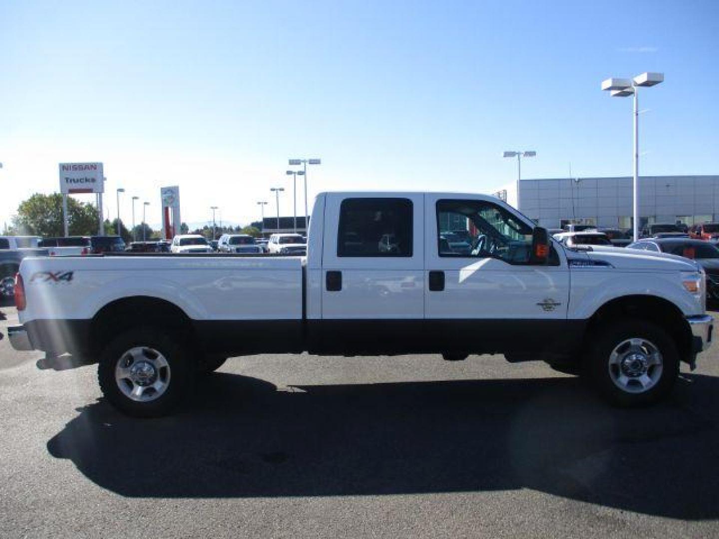 2015 Oxford White /Gray, cloth Ford F-350 SD XLT Crew Cab Long Bed 4WD (1FT8W3BT9FE) with an 6.7L V8 OHV 16V DIESEL engine, 6-Speed Automatic transmission, located at 1235 N Woodruff Ave., Idaho Falls, 83401, (208) 523-1053, 43.507172, -112.000488 - This long bed diesel comes in the FX4 package, newer tires with 80% tread left, tow mirrors, vinyl flooring, exhaust brake and more! These SuperCrews have all the leg room you need and them some! They are perfect for work crews or families! At timberline Auto it is always easy to find a great deal o - Photo#6