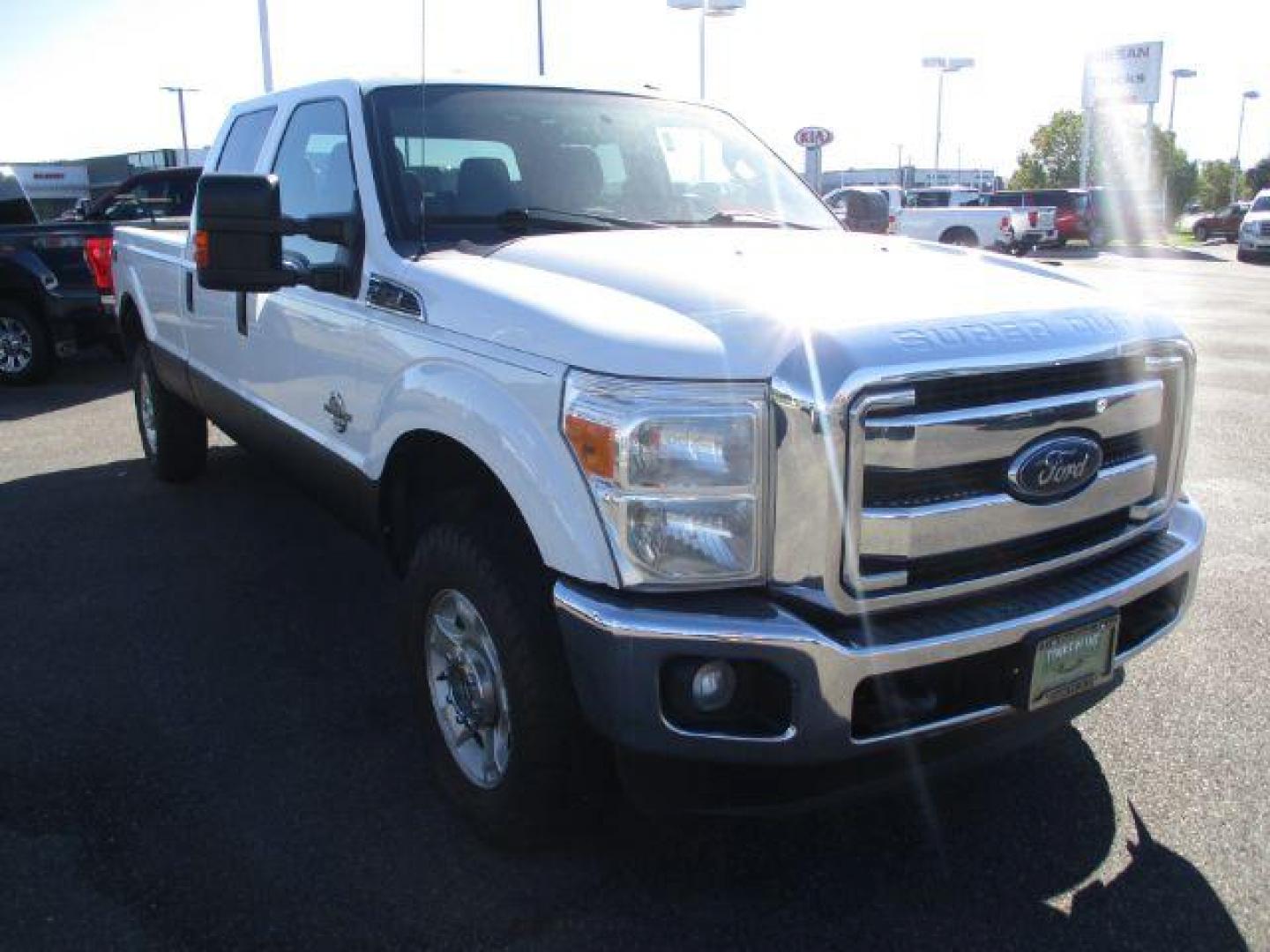 2015 Oxford White /Gray, cloth Ford F-350 SD XLT Crew Cab Long Bed 4WD (1FT8W3BT9FE) with an 6.7L V8 OHV 16V DIESEL engine, 6-Speed Automatic transmission, located at 1235 N Woodruff Ave., Idaho Falls, 83401, (208) 523-1053, 43.507172, -112.000488 - This long bed diesel comes in the FX4 package, newer tires with 80% tread left, tow mirrors, vinyl flooring, exhaust brake and more! These SuperCrews have all the leg room you need and them some! They are perfect for work crews or families! At timberline Auto it is always easy to find a great deal o - Photo#7