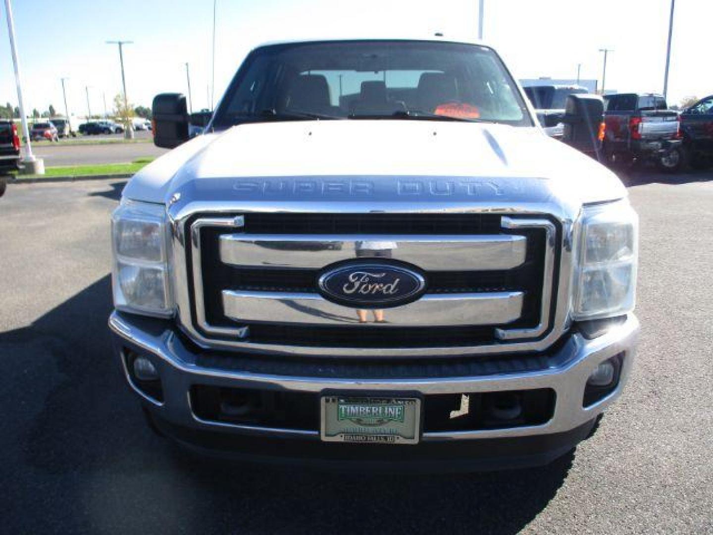 2015 Oxford White /Gray, cloth Ford F-350 SD XLT Crew Cab Long Bed 4WD (1FT8W3BT9FE) with an 6.7L V8 OHV 16V DIESEL engine, 6-Speed Automatic transmission, located at 1235 N Woodruff Ave., Idaho Falls, 83401, (208) 523-1053, 43.507172, -112.000488 - This long bed diesel comes in the FX4 package, newer tires with 80% tread left, tow mirrors, vinyl flooring, exhaust brake and more! These SuperCrews have all the leg room you need and them some! They are perfect for work crews or families! At timberline Auto it is always easy to find a great deal o - Photo#8