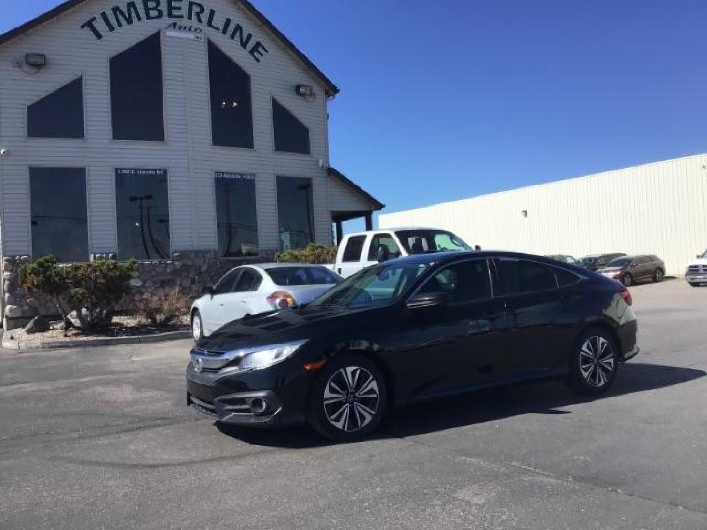 2017 Crystal Black Pearl /Black, leather Honda Civic EX-TL Sedan CVT (19XFC1F78HE) with an 1.5L L4 DOHC 16V TURBO engine, Automatic transmission, located at 1235 N Woodruff Ave., Idaho Falls, 83401, (208) 523-1053, 43.507172, -112.000488 - At Timberline Auto it is always easy to find a great deal on your next vehicle! Our experienced sales staff can help find the right vehicle will fit your needs. Our knowledgeable finance department has options for almost any credit score. We offer many warranty contract options to protect you new pr - Photo#0