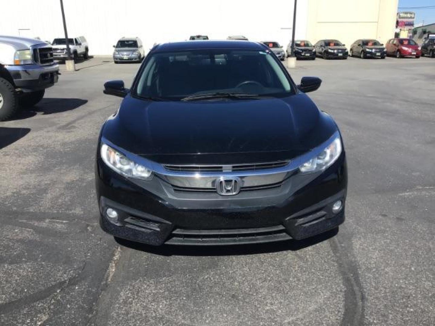 2017 Crystal Black Pearl /Black, leather Honda Civic EX-TL Sedan CVT (19XFC1F78HE) with an 1.5L L4 DOHC 16V TURBO engine, Automatic transmission, located at 1235 N Woodruff Ave., Idaho Falls, 83401, (208) 523-1053, 43.507172, -112.000488 - At Timberline Auto it is always easy to find a great deal on your next vehicle! Our experienced sales staff can help find the right vehicle will fit your needs. Our knowledgeable finance department has options for almost any credit score. We offer many warranty contract options to protect you new pr - Photo#9