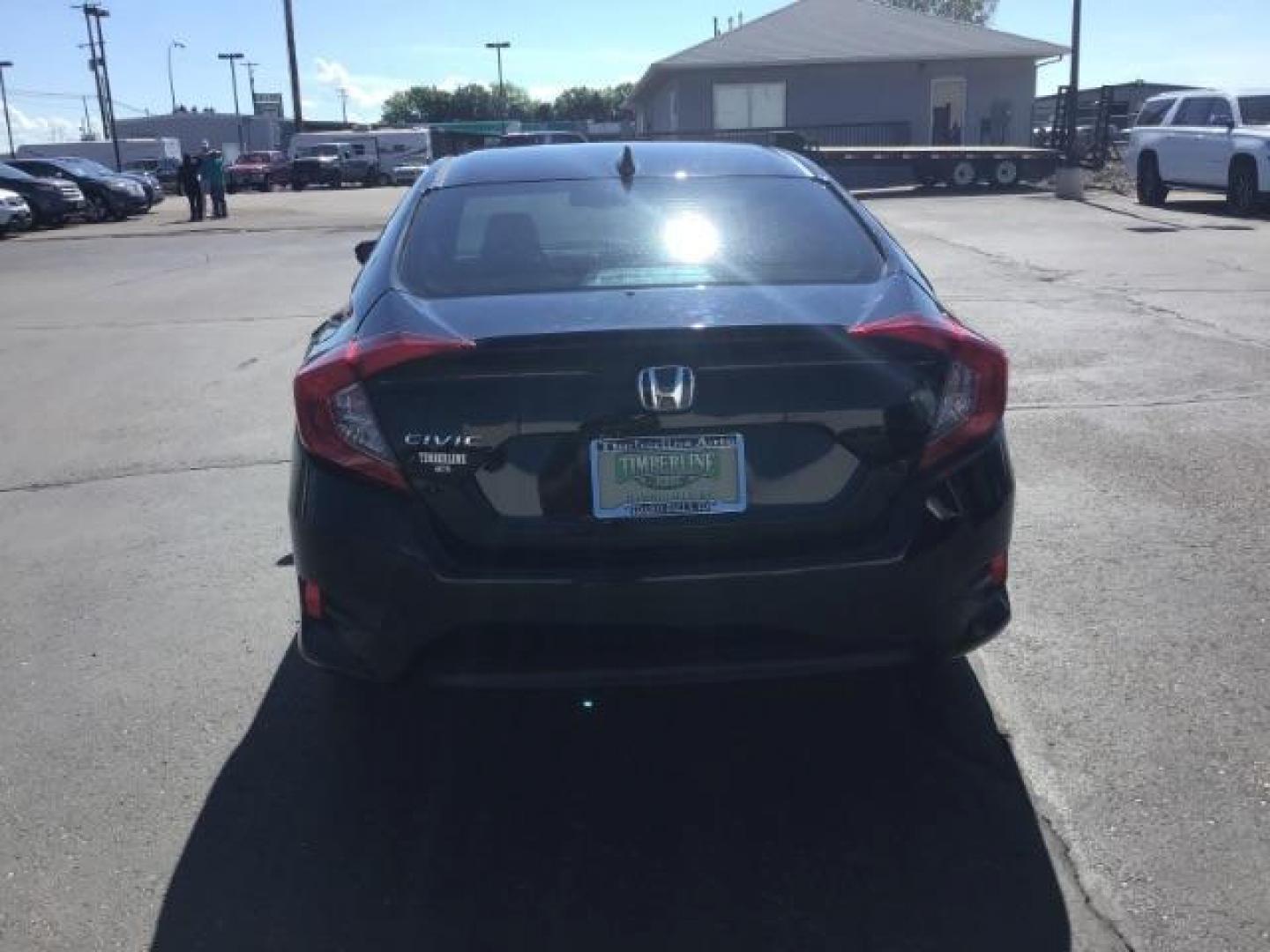 2017 Crystal Black Pearl /Black, leather Honda Civic EX-TL Sedan CVT (19XFC1F78HE) with an 1.5L L4 DOHC 16V TURBO engine, Automatic transmission, located at 1235 N Woodruff Ave., Idaho Falls, 83401, (208) 523-1053, 43.507172, -112.000488 - At Timberline Auto it is always easy to find a great deal on your next vehicle! Our experienced sales staff can help find the right vehicle will fit your needs. Our knowledgeable finance department has options for almost any credit score. We offer many warranty contract options to protect you new pr - Photo#3