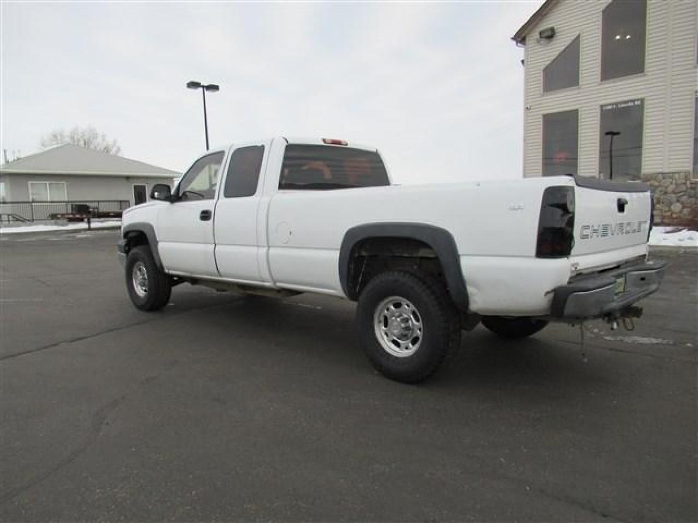 2005 WHITE /WHITE Chevrolet Silverado 2500HD LT Ext. Cab Long Bed 4WD (1GCHK29215E) with an 6.6L V8 OHV 32V TURBO DIESEL engine, located at 1235 N Woodruff Ave., Idaho Falls, 83401, (208) 523-1053, 43.507172, -112.000488 - This 2005 Chevrolet 2500, is 4x4, 6.6L V8 diesel. Has vinyl floor, 8 foot bed, that is Rhino Lined. Also has new tires. At Timberline Auto it is always easy to find a great deal on your next vehicle! Our experienced sales staff can help find the right vehicle will fit your needs. Our knowledgeable f - Photo#2