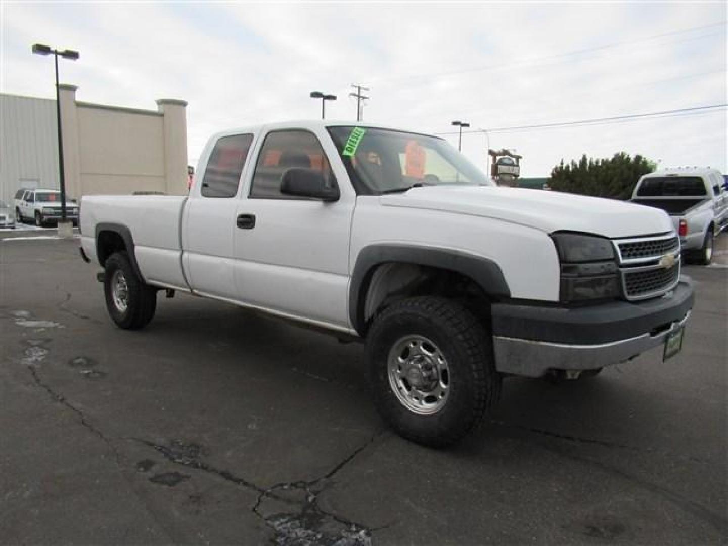 2005 WHITE /WHITE Chevrolet Silverado 2500HD LT Ext. Cab Long Bed 4WD (1GCHK29215E) with an 6.6L V8 OHV 32V TURBO DIESEL engine, located at 1235 N Woodruff Ave., Idaho Falls, 83401, (208) 523-1053, 43.507172, -112.000488 - This 2005 Chevrolet 2500, is 4x4, 6.6L V8 diesel. Has vinyl floor, 8 foot bed, that is Rhino Lined. Also has new tires. At Timberline Auto it is always easy to find a great deal on your next vehicle! Our experienced sales staff can help find the right vehicle will fit your needs. Our knowledgeable f - Photo#6