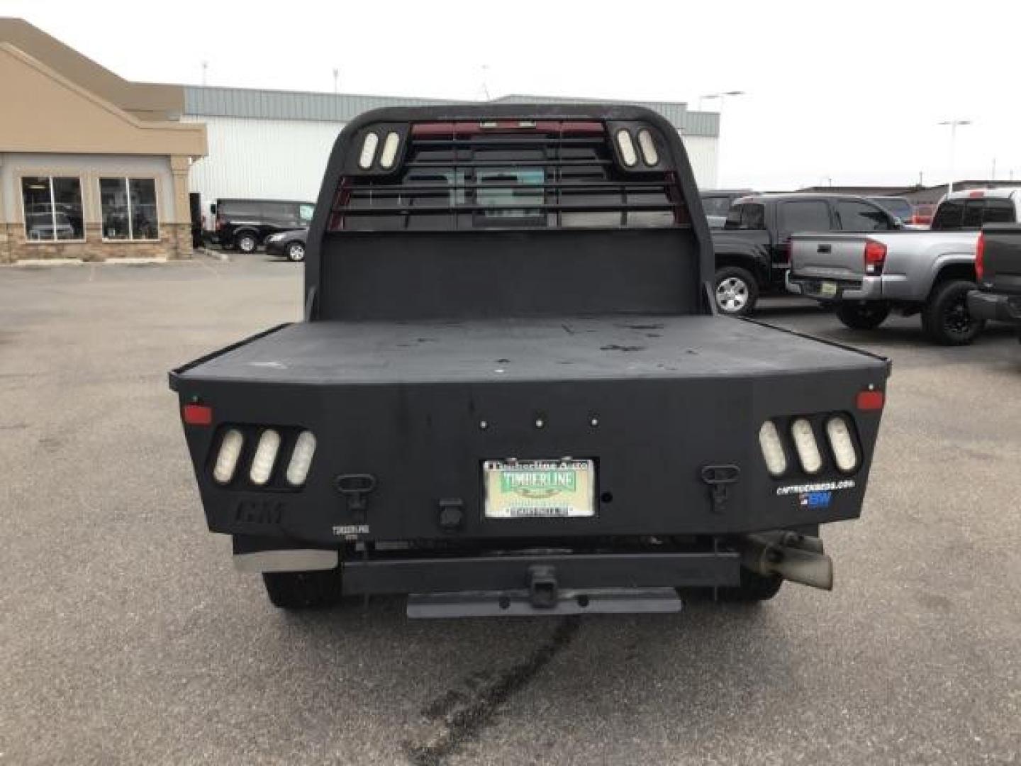 2012 MAROON /Black Leather Interior Ford F-350 SD Lariat Crew Cab 4WD (1FT8W3BTXCE) with an 6.7L V8 OHV 16V DIESEL engine, 6-Speed Automatic transmission, located at 1235 N Woodruff Ave., Idaho Falls, 83401, (208) 523-1053, 43.507172, -112.000488 - This 2012 F350 Lariat, has the 6.7L motor. Only has 103,372 miles. It is a flat bed. It comes with black leather seats, sunroof, navigation, heated and cooled seats,, and the exterior and interior are in great condition. At Timberline Auto it is always easy to find a great deal on your next vehicle - Photo#3